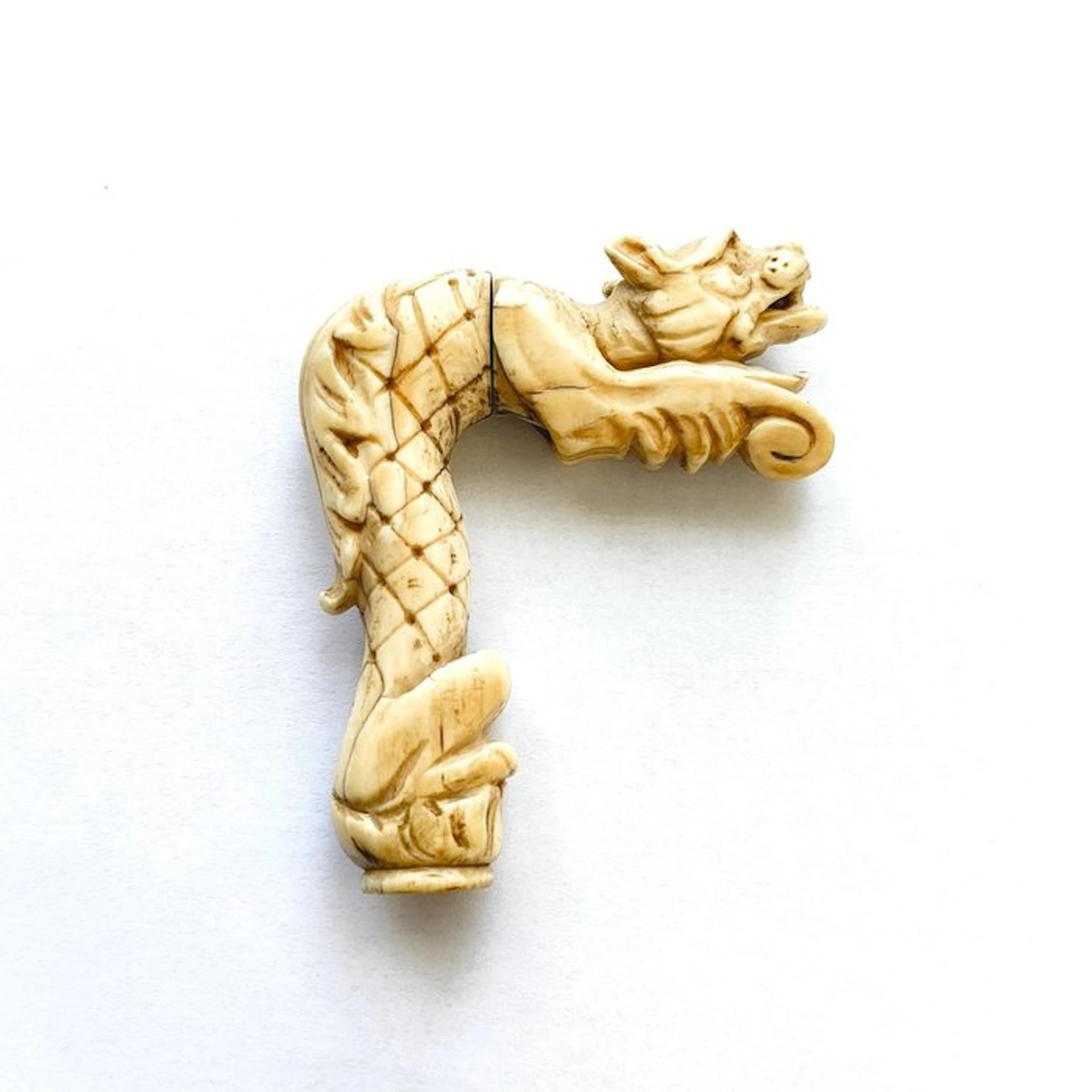 Western Asiaitc Bone Resting Wolf Cane Ending Bead - 77 mm