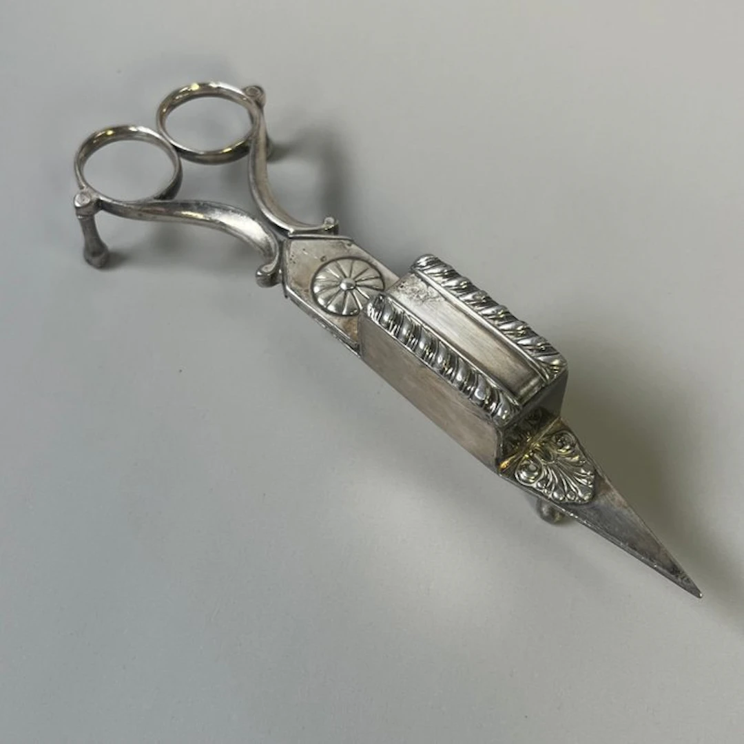 Decorative ornament - Antique candle snuffer on three...