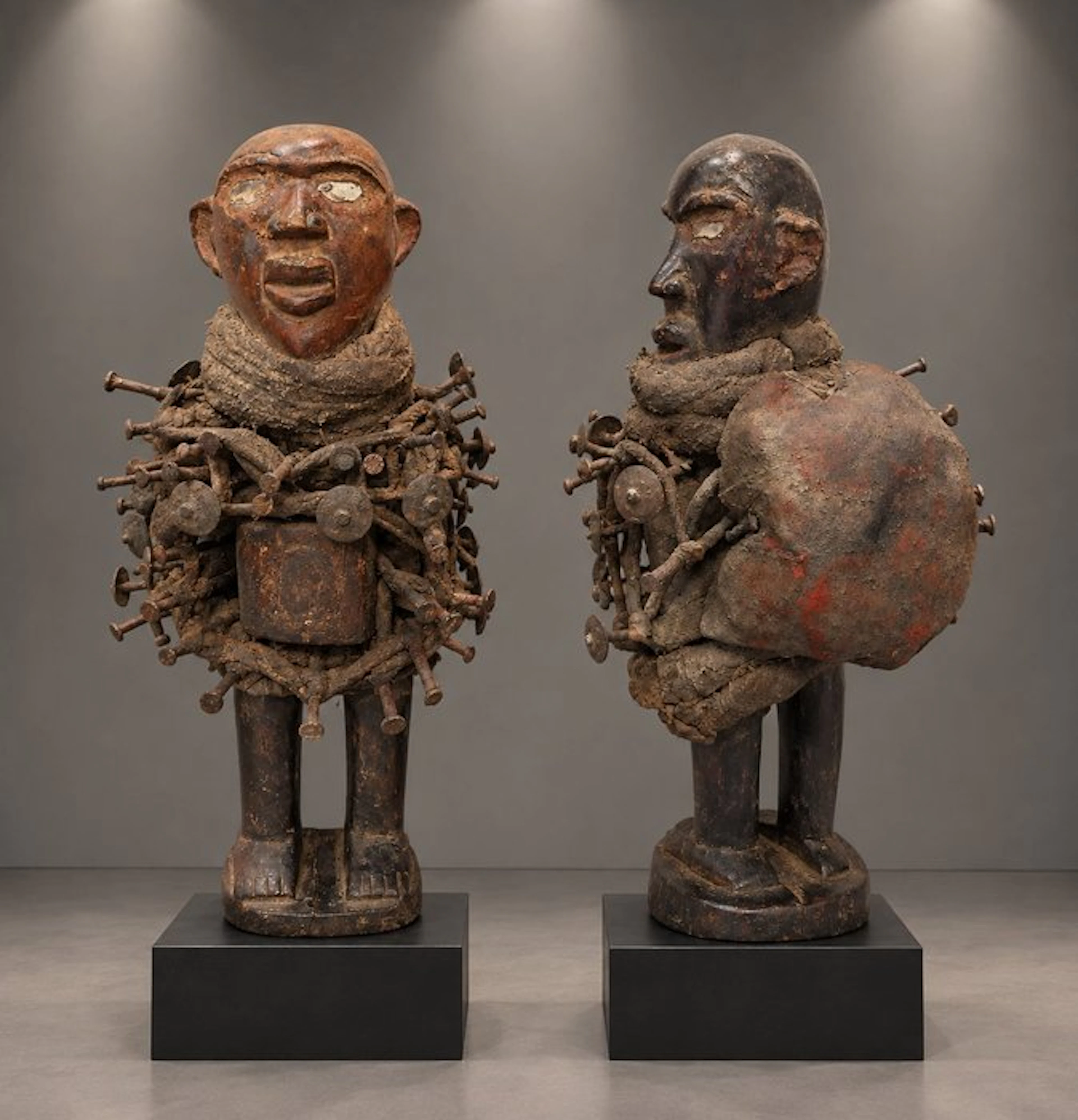 RARE PAIR OF NKISI NKONDI POWER FIGURES WITH NAILS –...