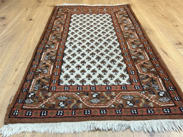 Stunning hand-knotted Sarough Mir rug with a fine Boteh...