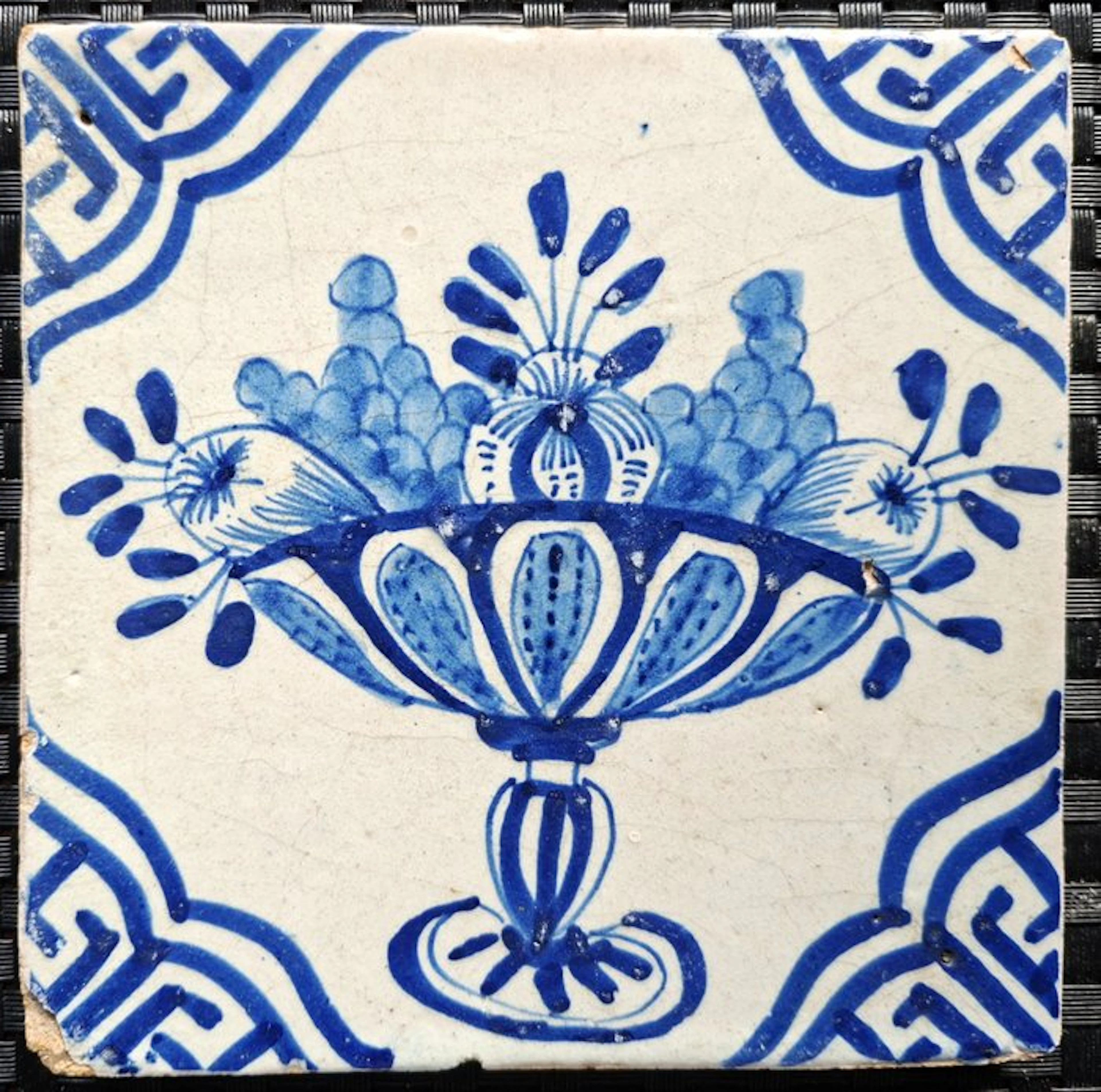 Tile - Antique tile with fruit bowl. - 1600-1650