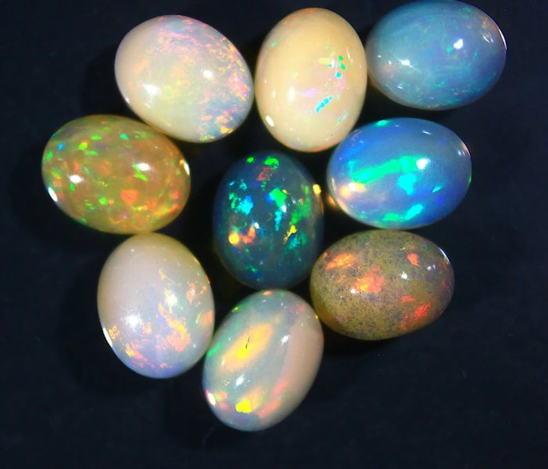 Ct. 10.60 Natural Ethiopian Opals Cabochon - Height: 9 mm - Width: 7 mm- 2.12 g