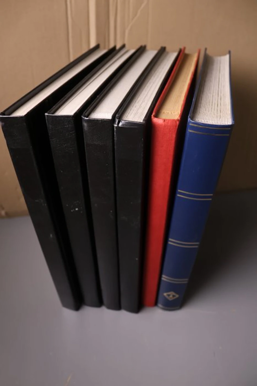 World - 6 empty stock books with white pages
