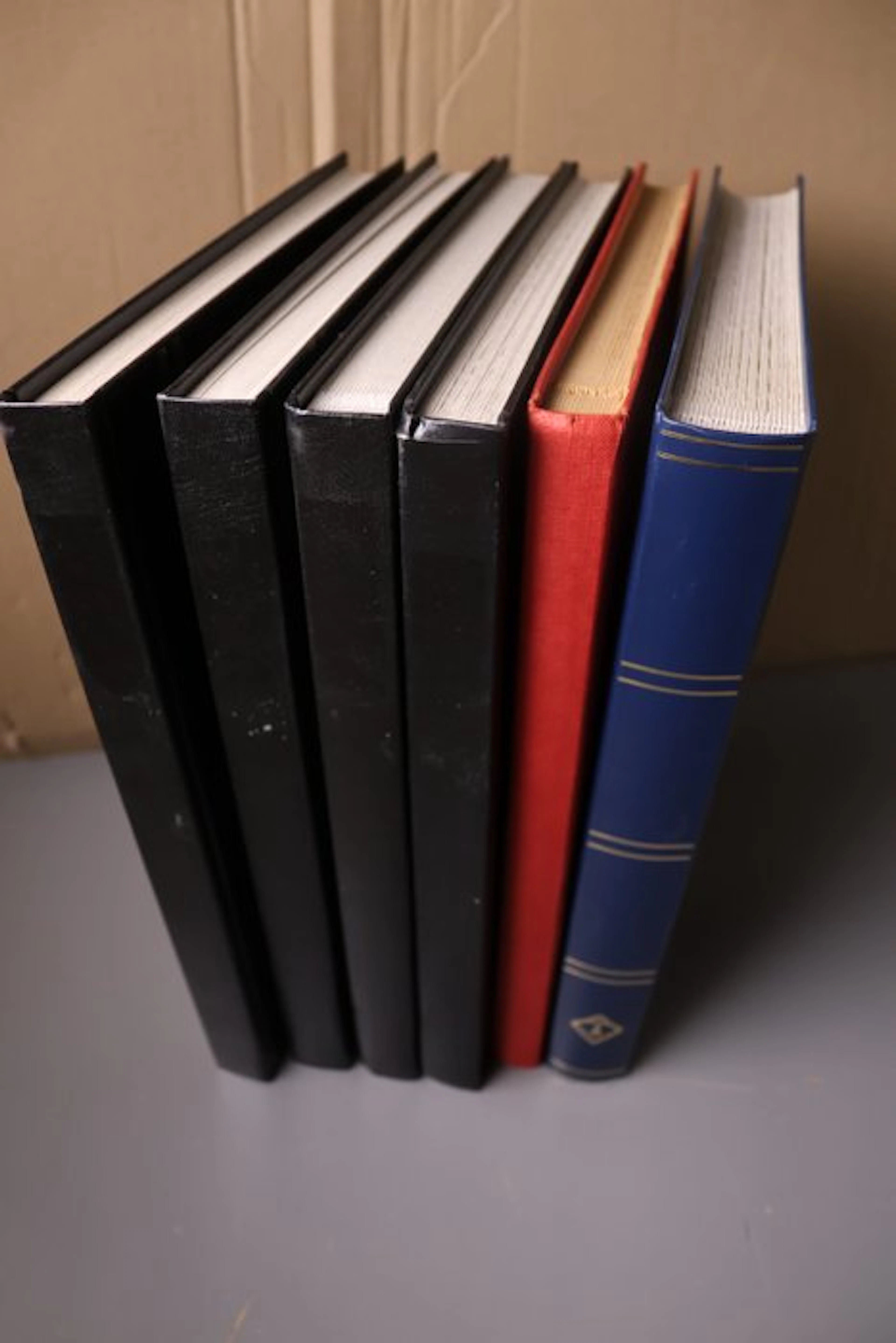 World - 6 empty stock books with white pages