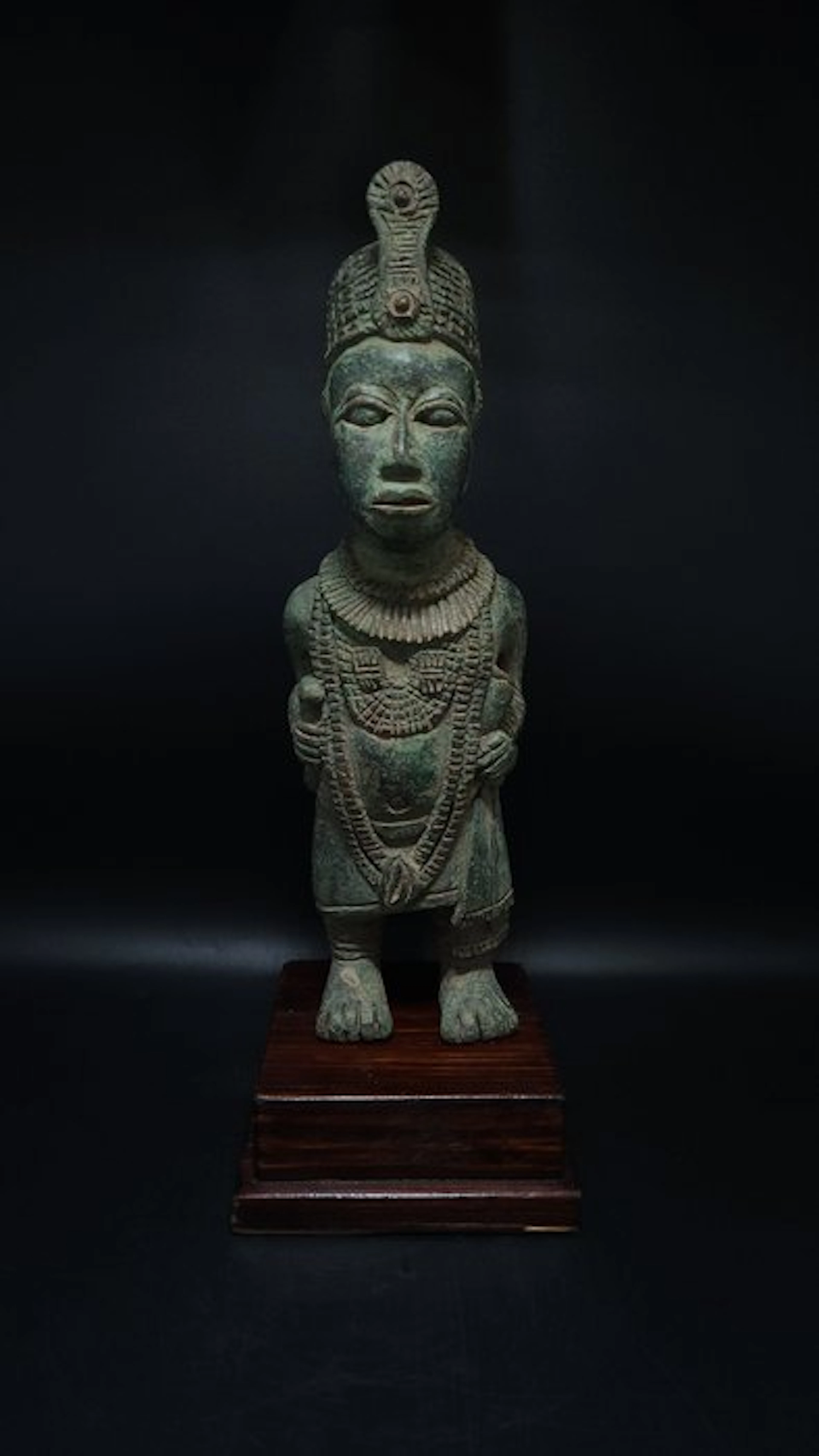 A superb statue of the Oba in war attire