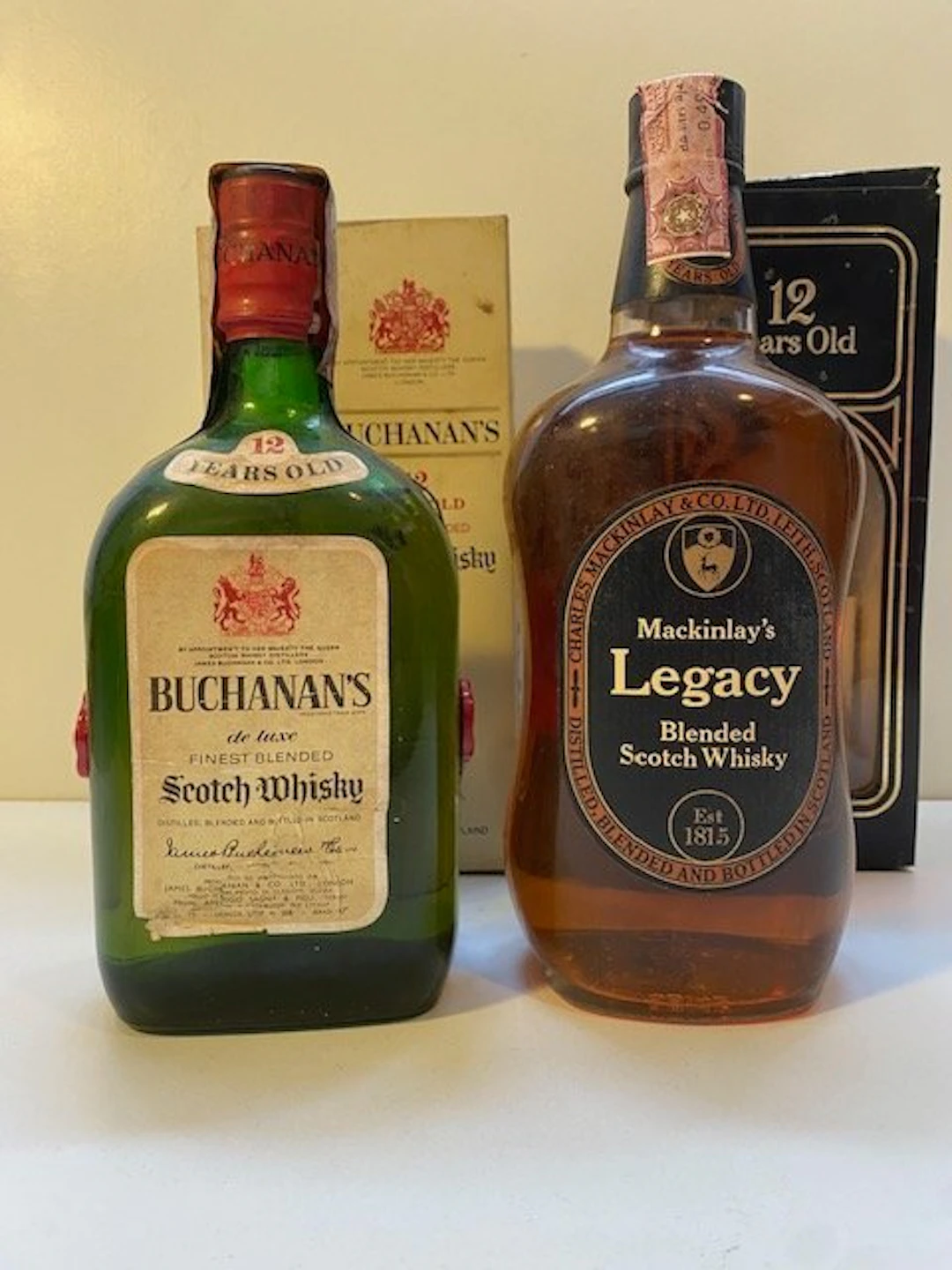 Mackinlay's Legacy 12yo + Buchanan 12yo - b. 1970s - 75cl - 2 bottles