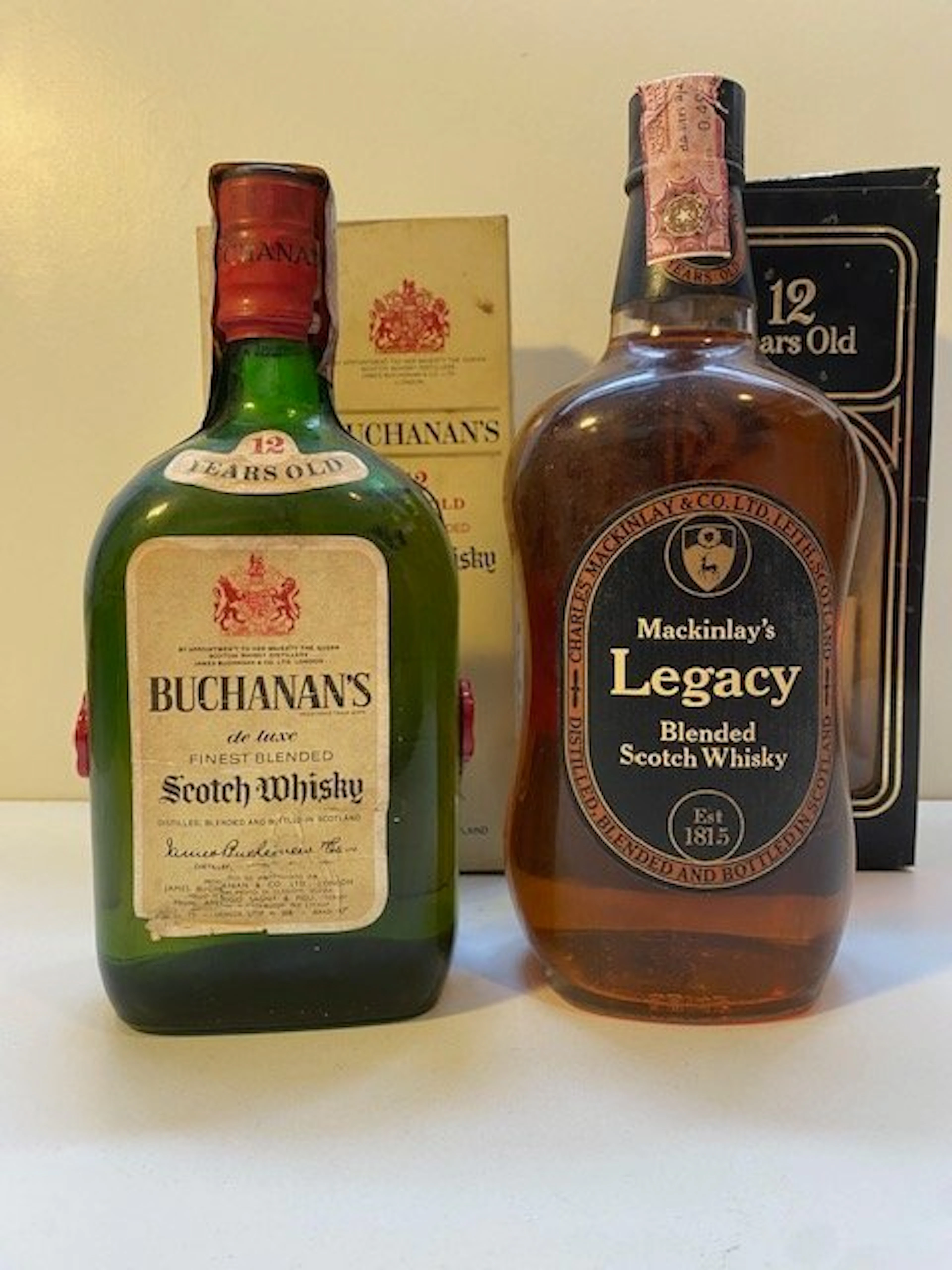 Mackinlay's Legacy 12yo + Buchanan 12yo - b. 1970s - 75cl - 2 bottles