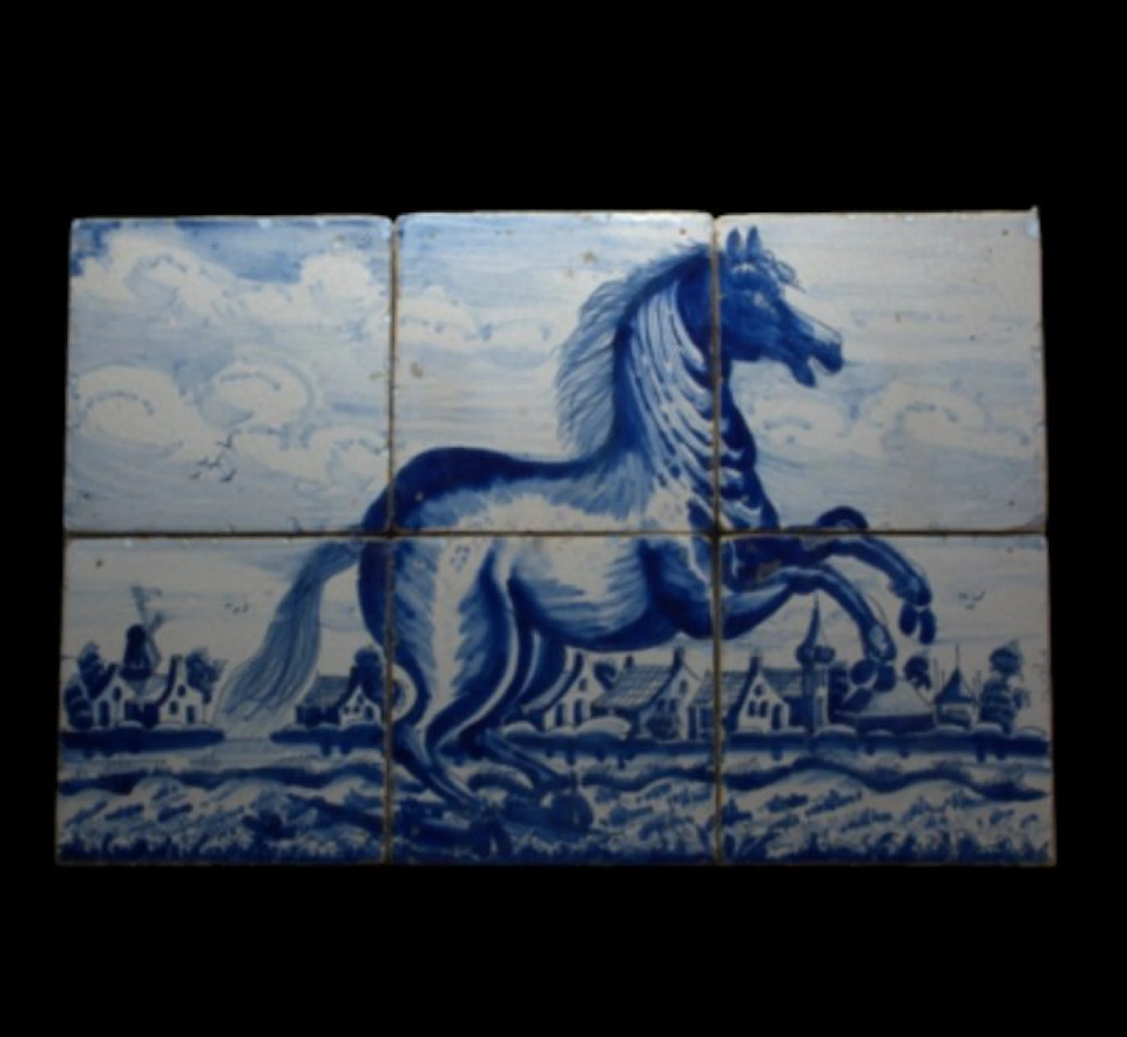 17th century earthenware Tile Tableau with a depiction of a prancing horse