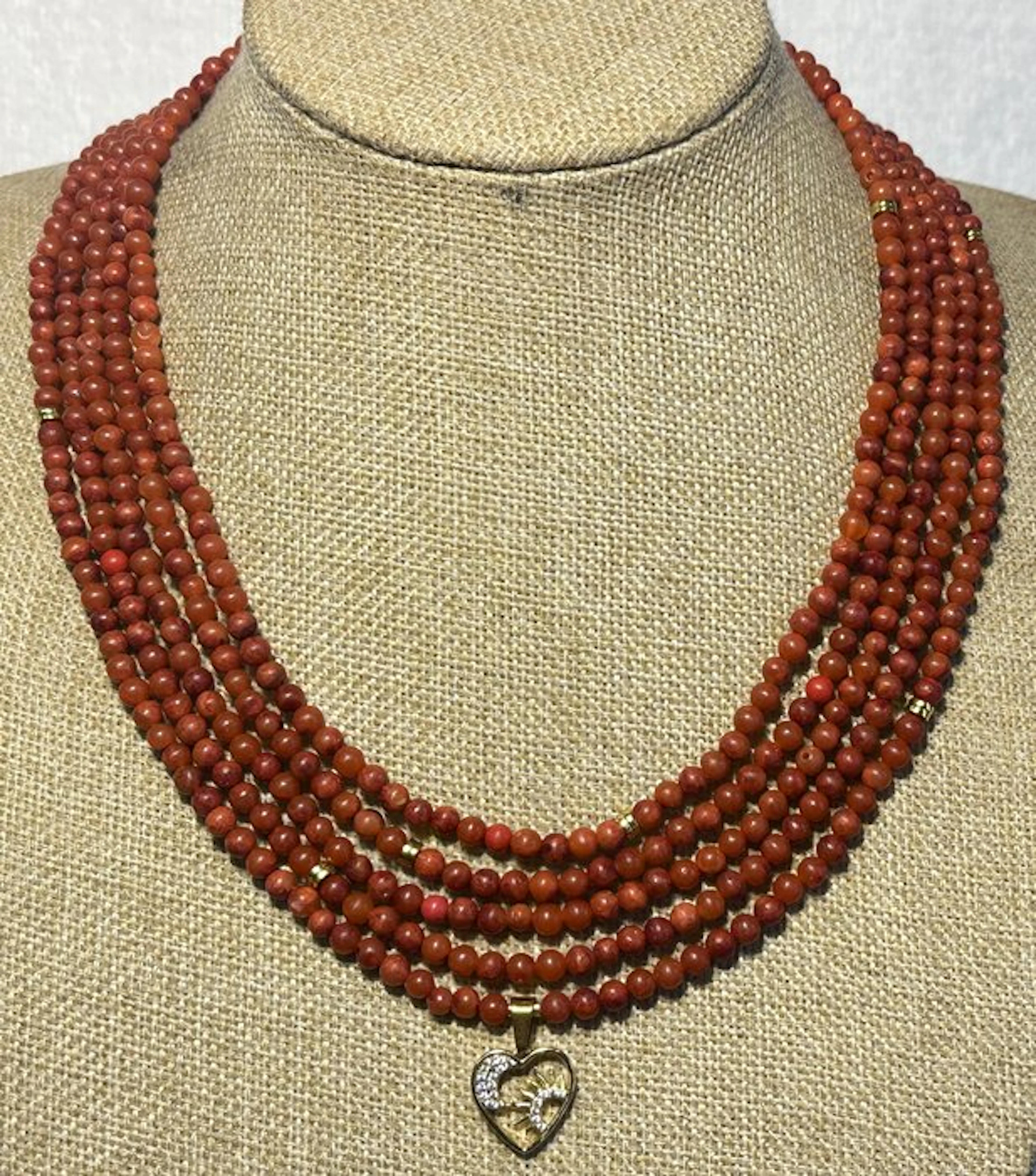 Apple Coral with heart pendant