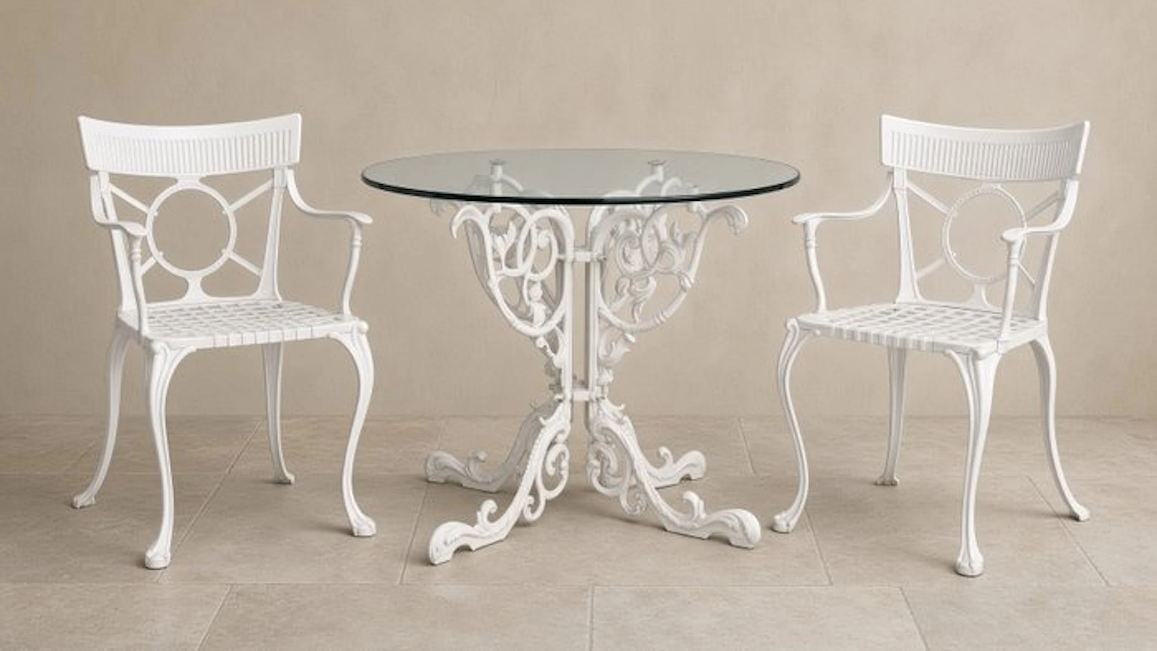 Outdoor furniture set - A Three-Piece White Painted Iron...