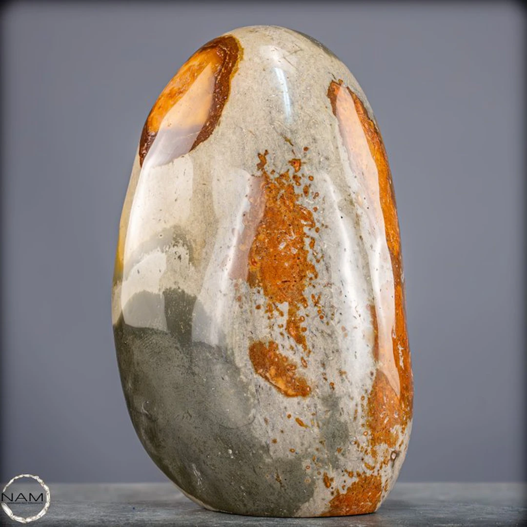 Expressive polychrome jasper Freeform with vibrant color play.- 3701.19 g