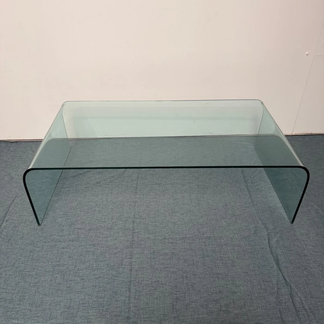 Table - Glass - Glass coffee table made of curved tempered glass.