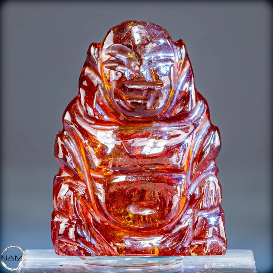 Sphalerite Lucky Buddha – Luminous carving in fiery...