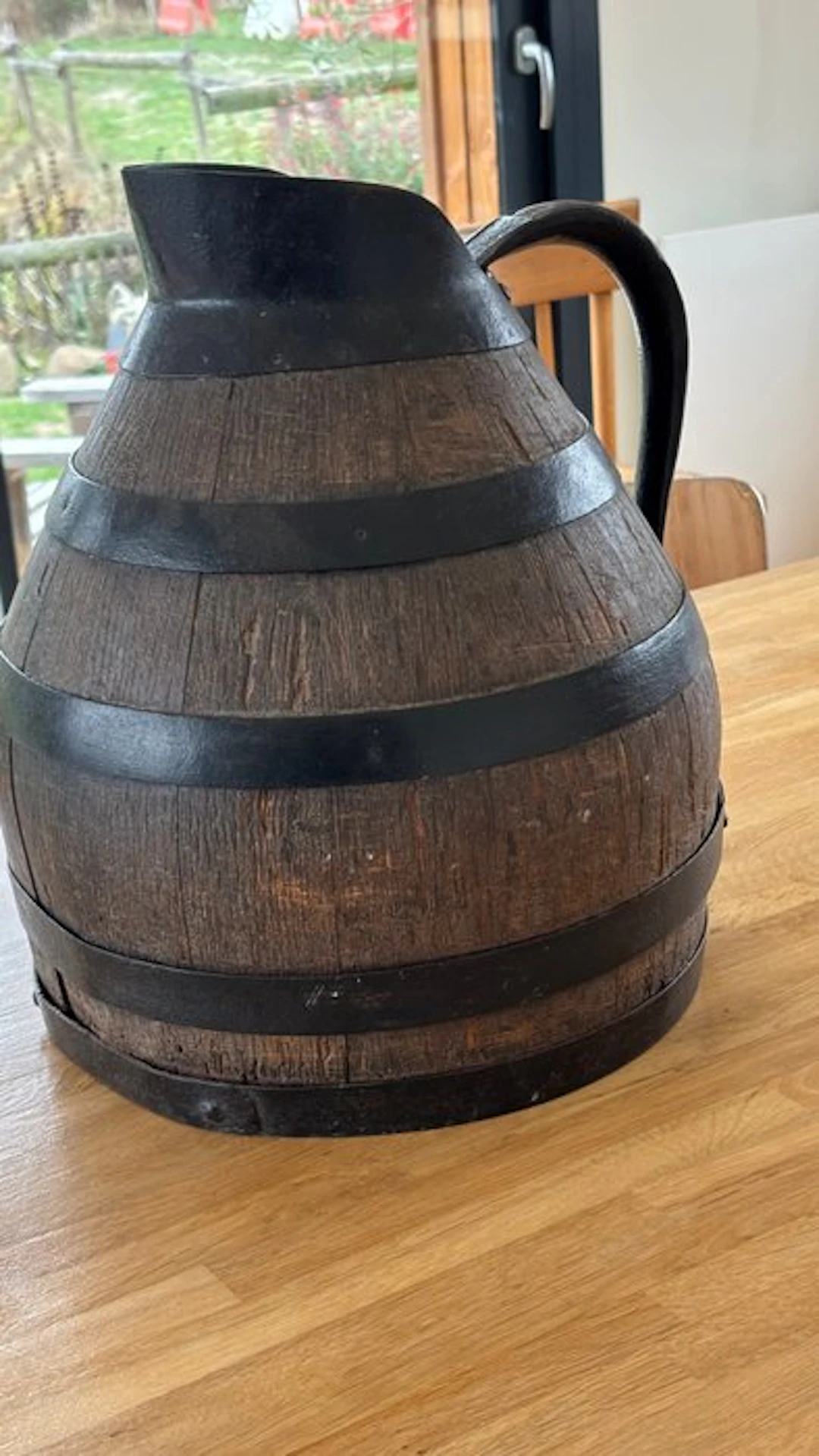 Pitcher - Steel, Wood - Carafe of Burgundy wine.