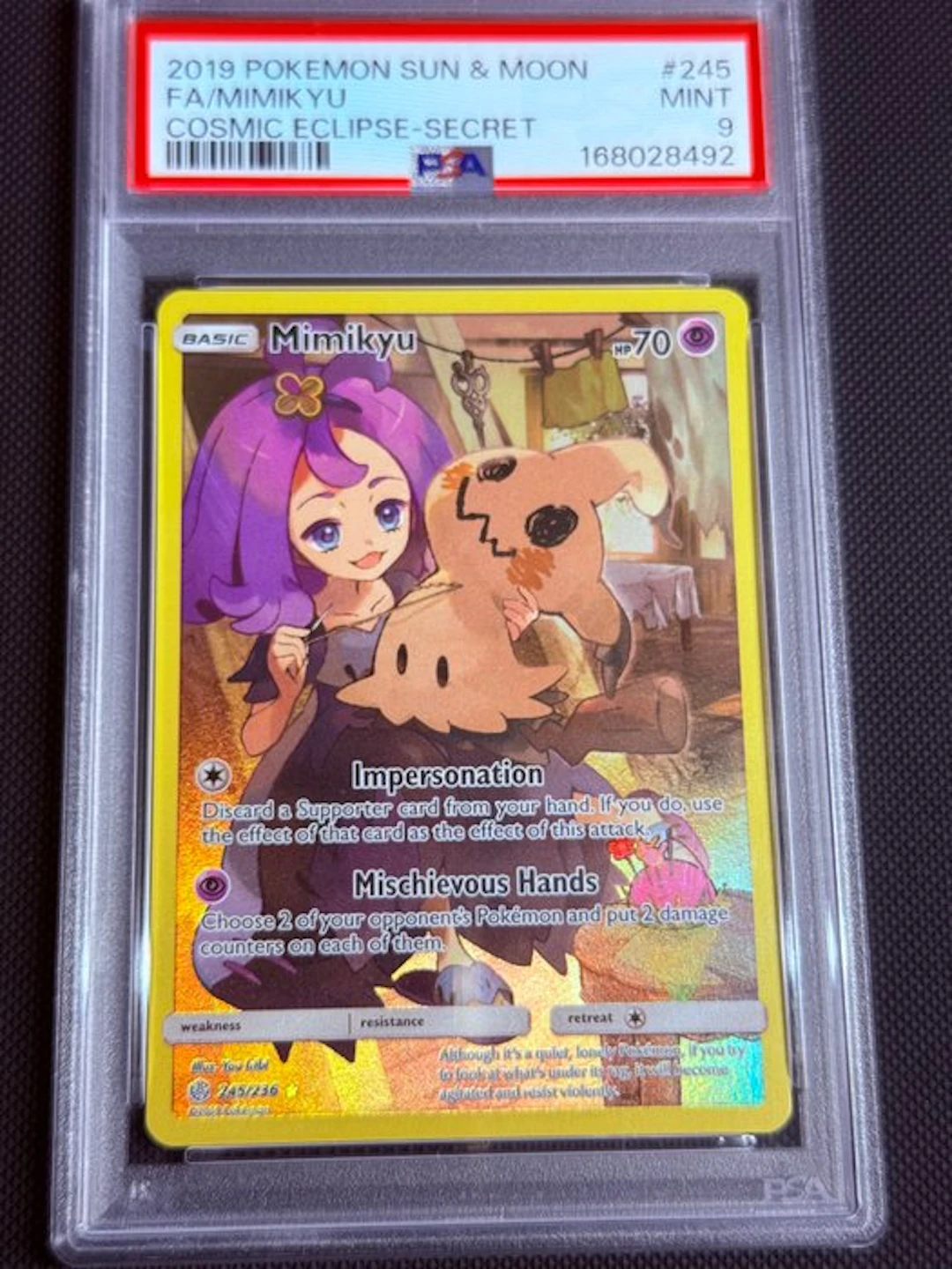 Pokémon - 1 Graded card - Mimikyu 245/236 Foil