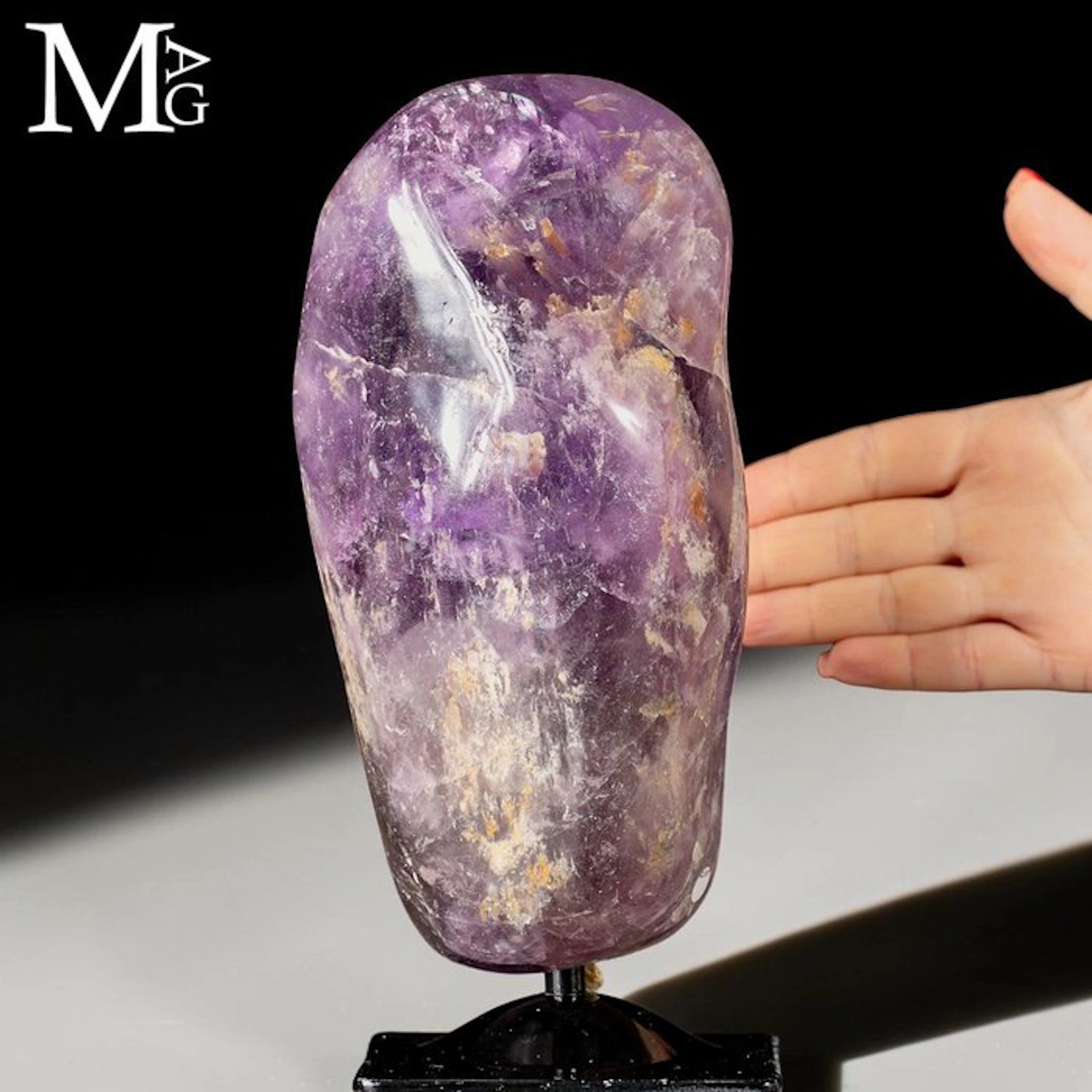 Large polished purple amethyst crystal Polished free-form...