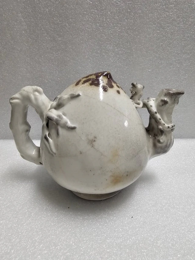 Chinese teapot shaped like a peach