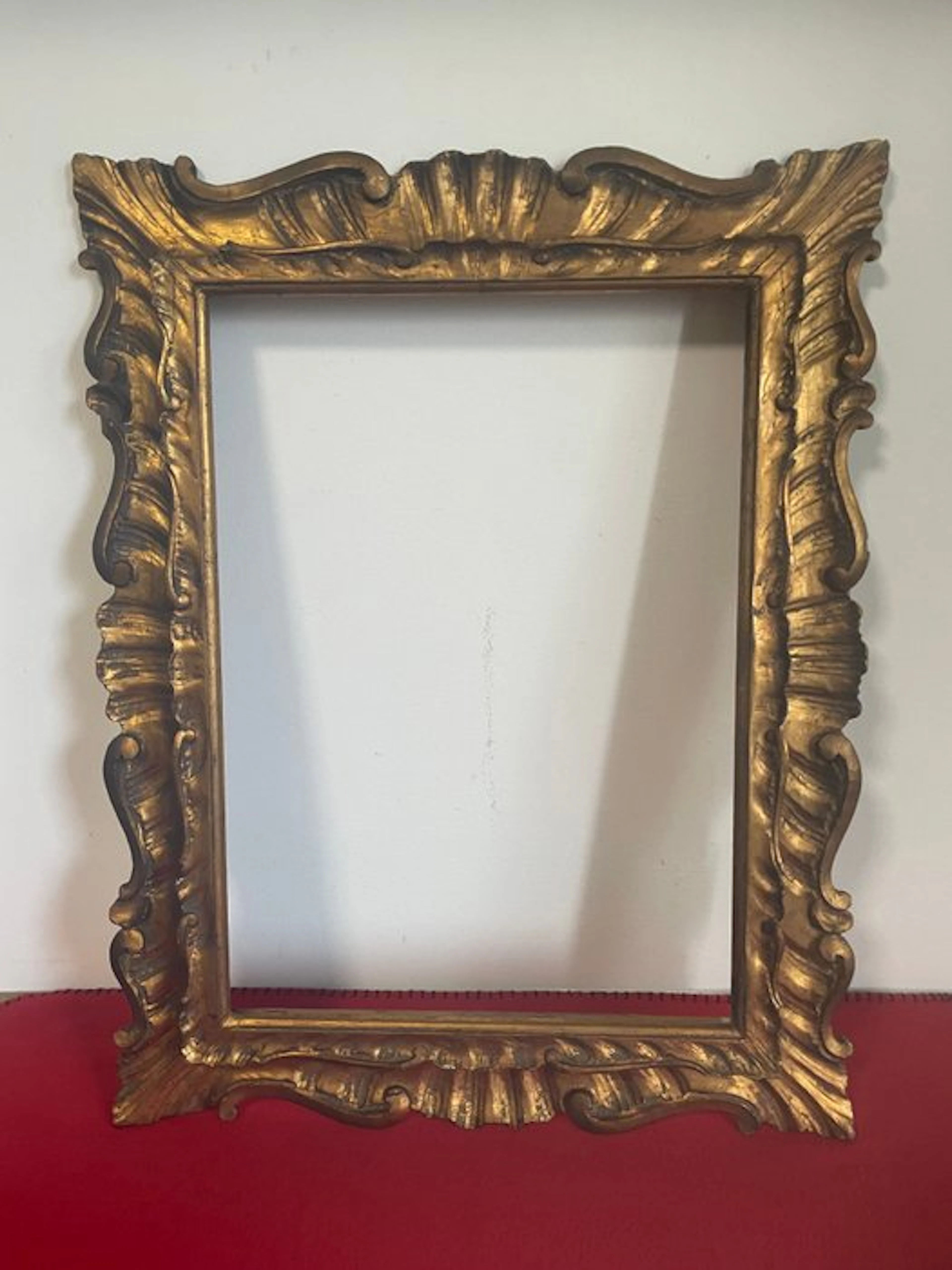 Frame - Large Venetian, carved and gilded wood.