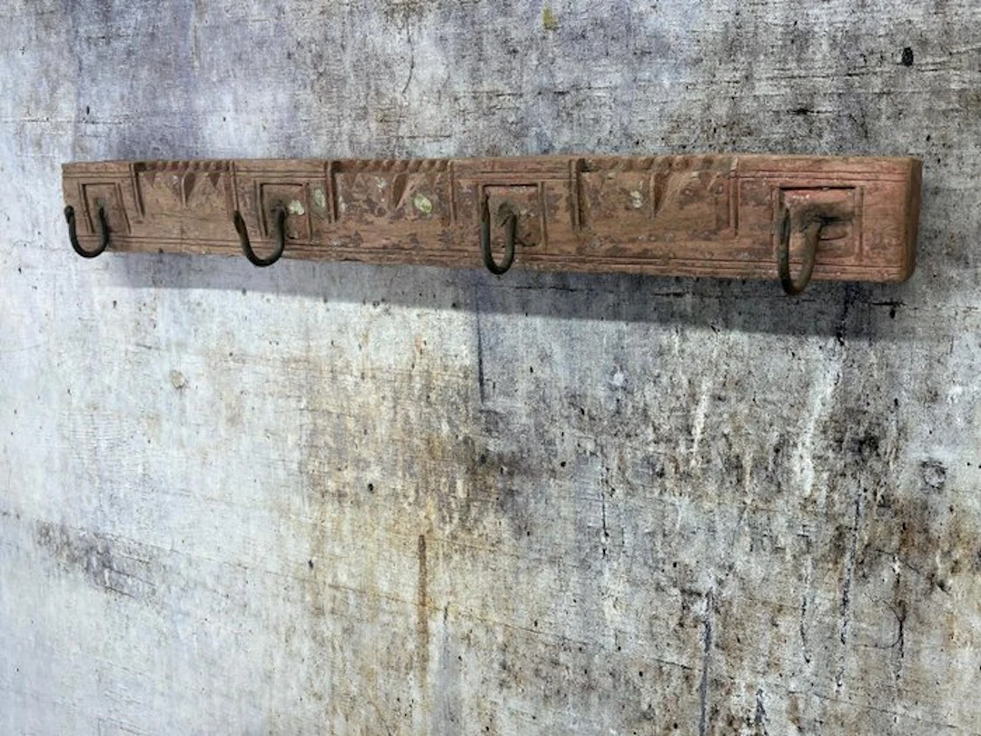 A coat rack made from an antique beam. - Wood - India - Late 20th century