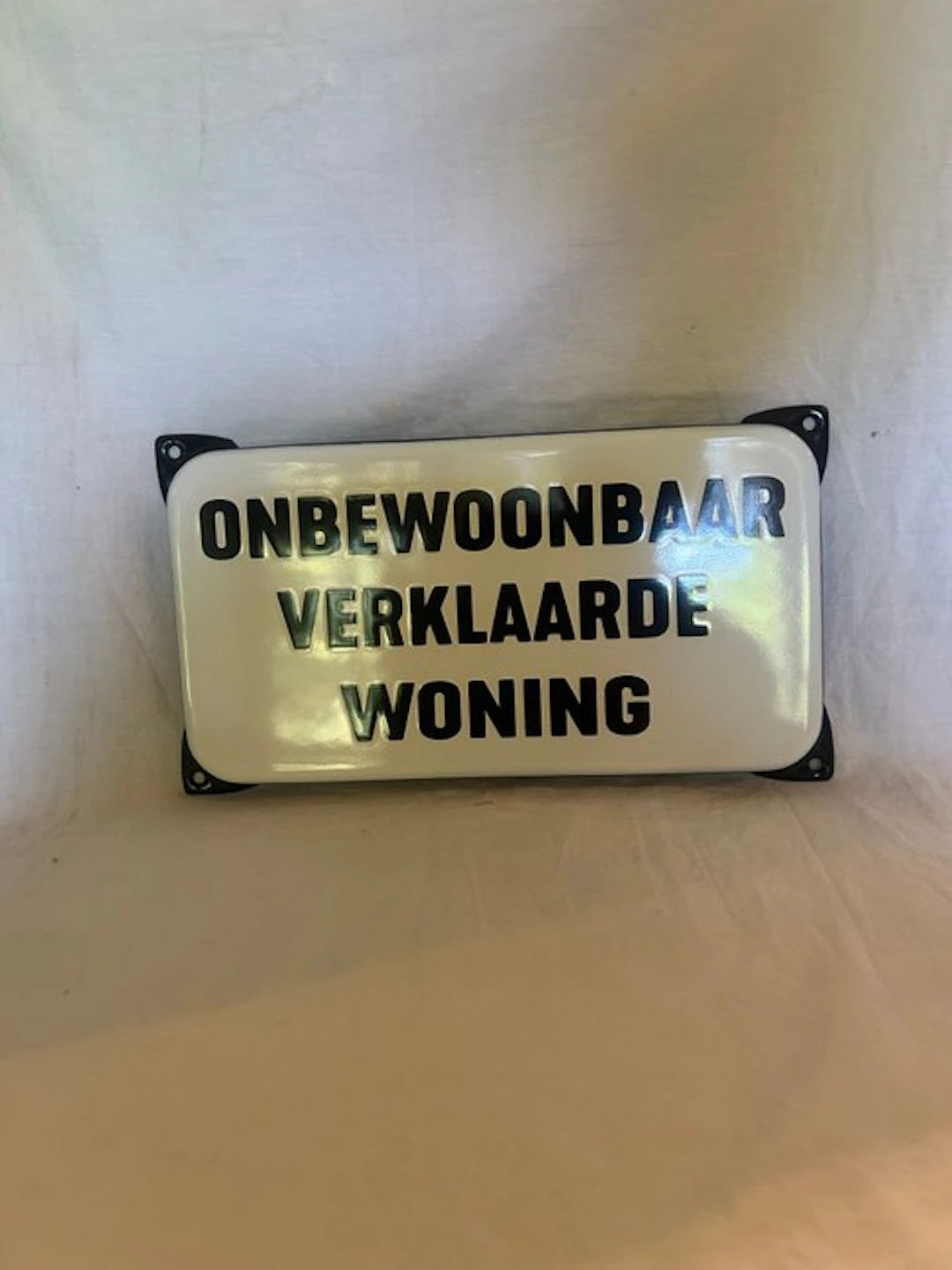 Enamel sign declaring the house uninhabitable. - Enamel sign - Enamel