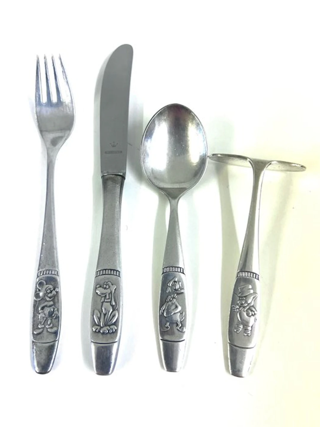 Donald Duck - 4 Children´s cutlery made of silver by Wilkens
