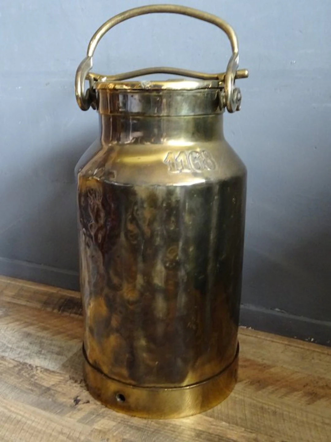 Creamer - Iron, seller - Copper-plated iron milk can.