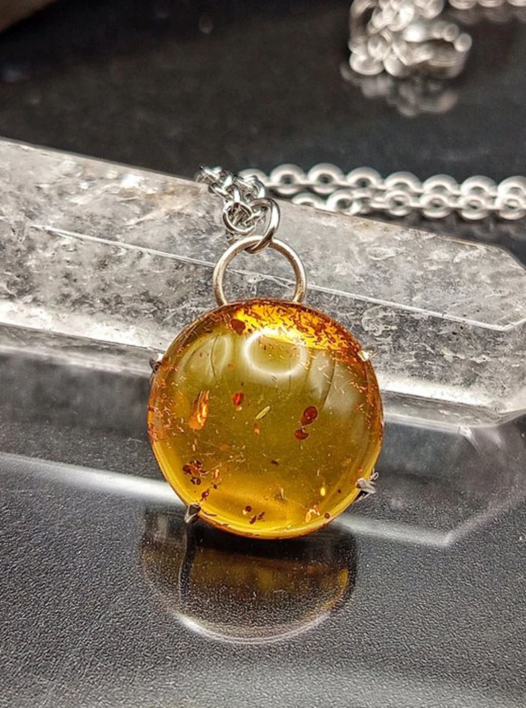Handcrafted jewelry in 925 sterling silver with Baltic amber