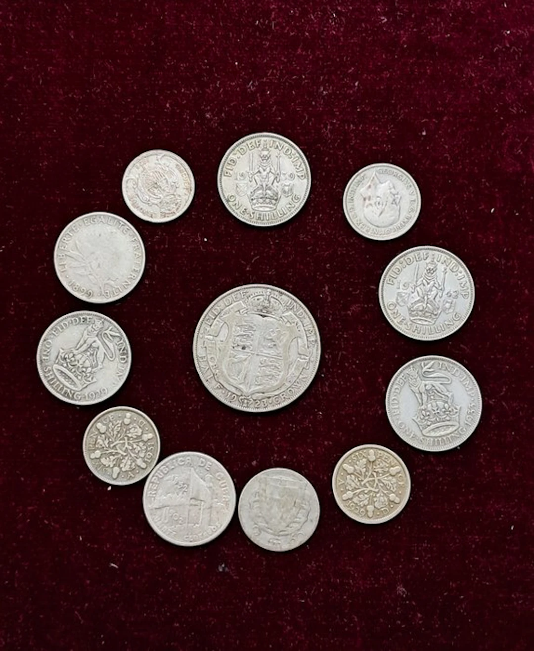 World. Collezione di 12 monete in argento di vari paesi...