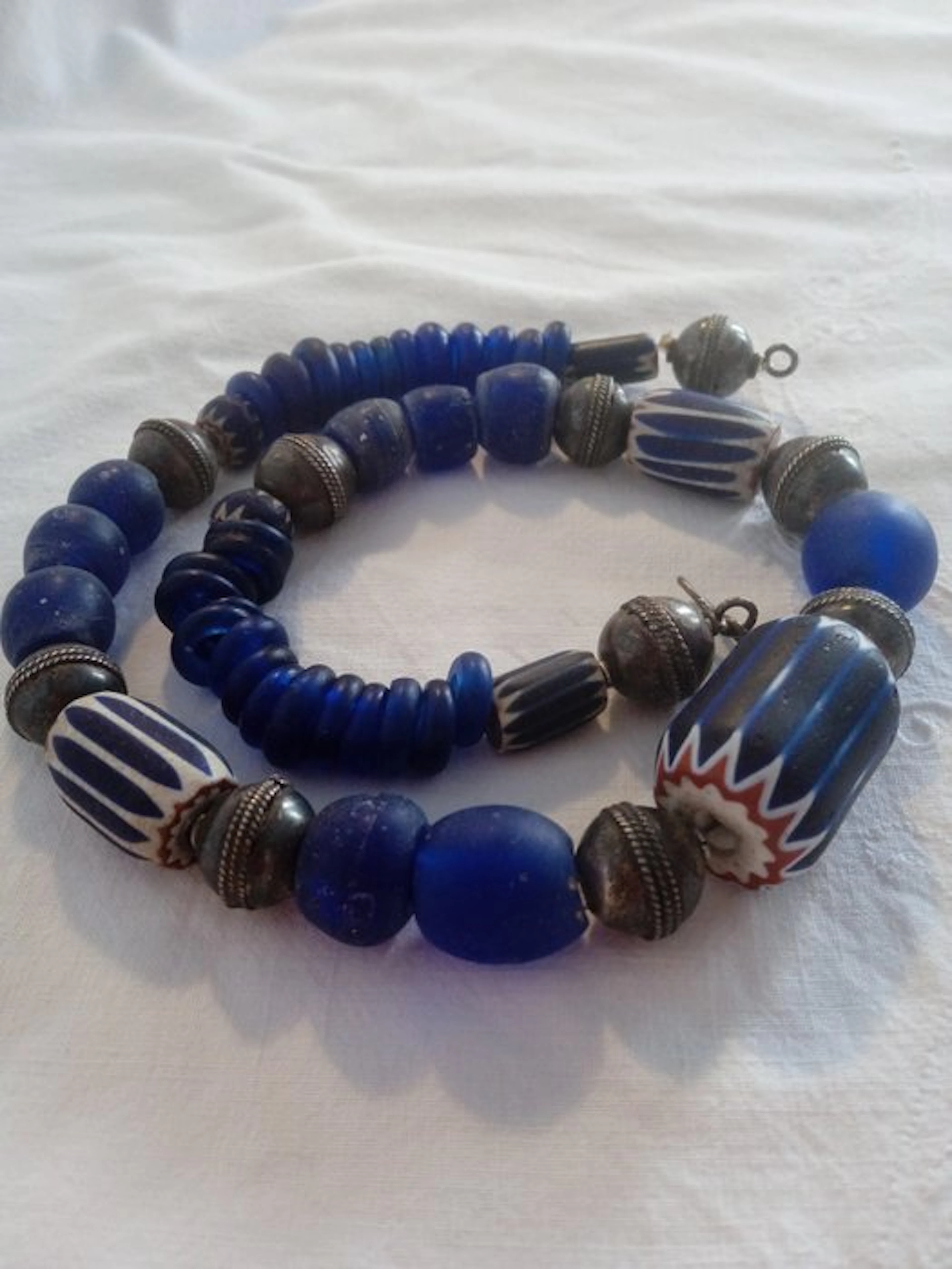 Contemporary design necklace with old glass trade beads
