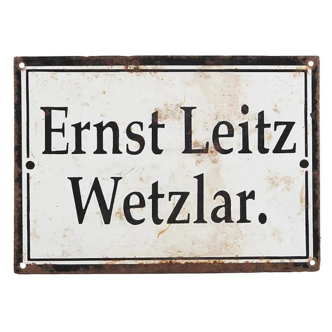PLAQUE ÉMAILLÉE ERNST LEITZ WETZLAR (19,5 x 27 cm) - Plaque émaillée - Fer