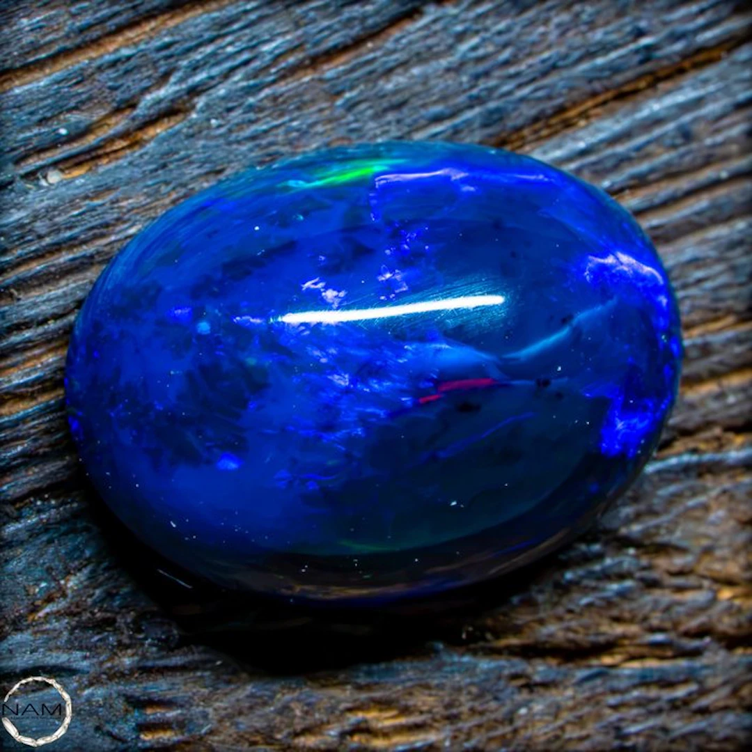 Black Opal Cabochon – Intense Play of Color in Perfect Form 9.1- 1.82 g