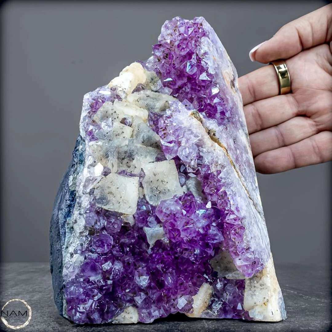 Extraordinary amethyst-calcite druzy with intense purple...