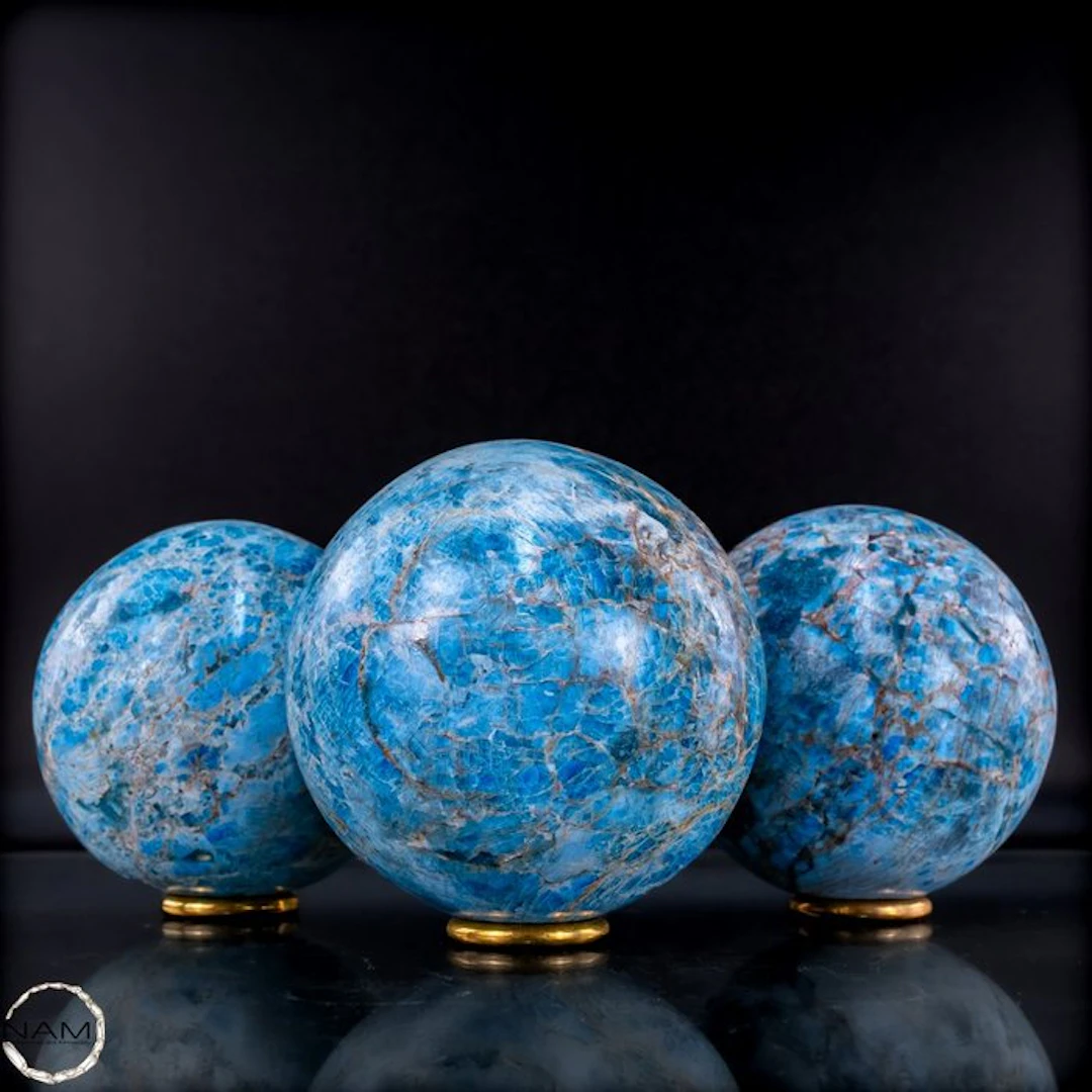 Natural apatite spheres – Set of three spheres in intense...