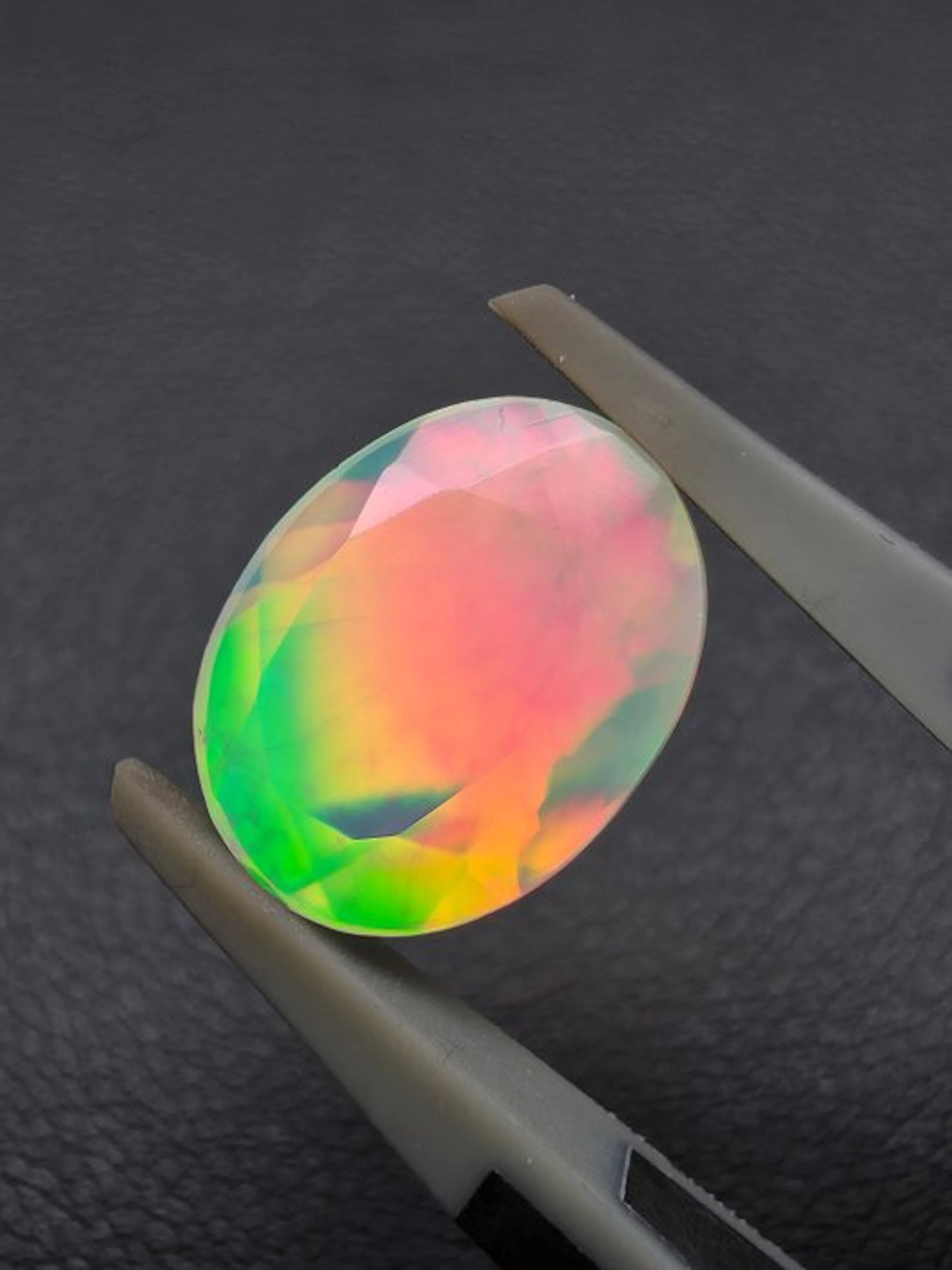1.94cts White Opal Faceted- 0.4 g