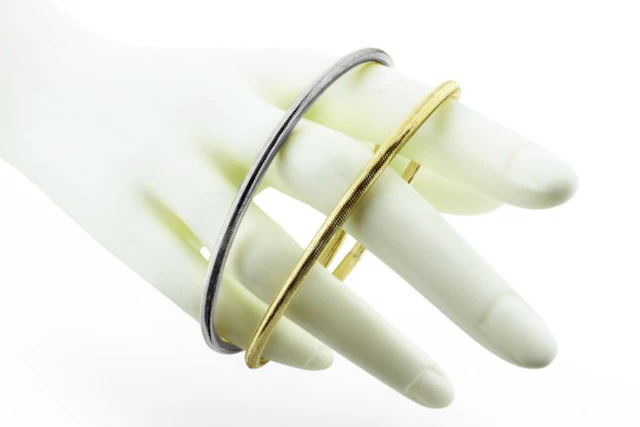 Bracelet - 18 kt. Yellow gold, White gold