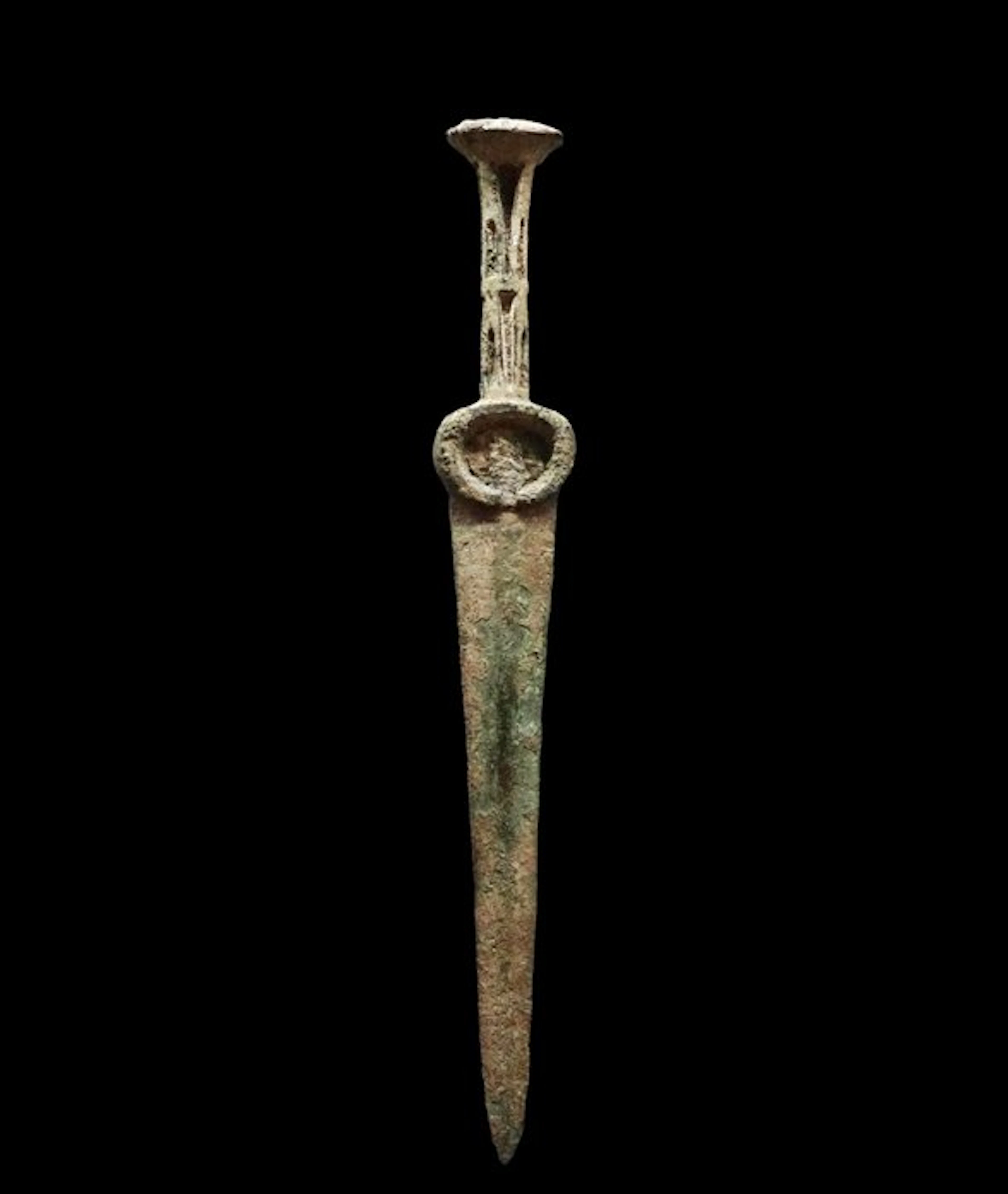Luristan Bronze - Bronze sword with a crescent moon motif...