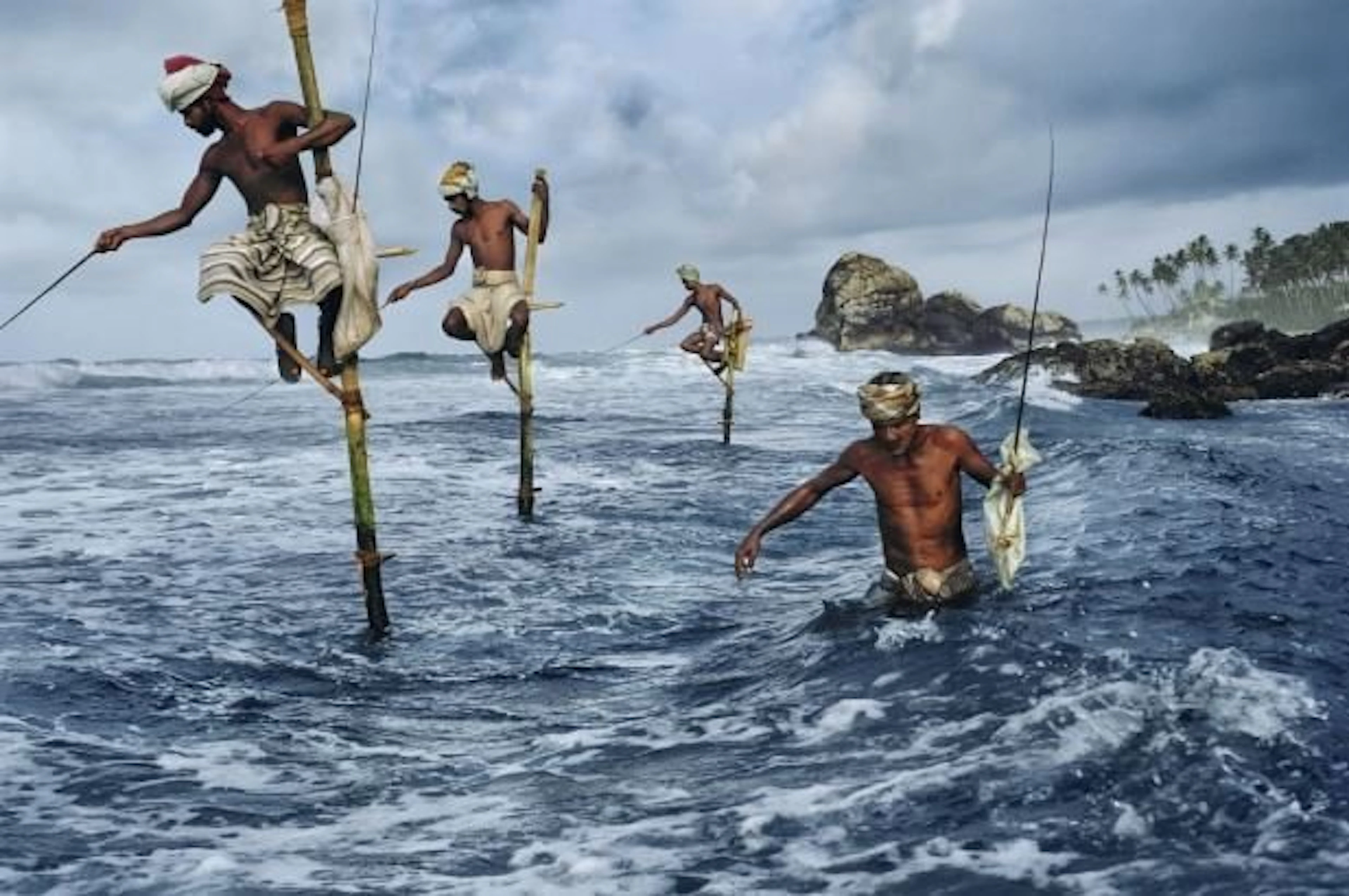 Steve McCurry (1950–) - Fishermen, Weligama, Sri Lanka, 1995