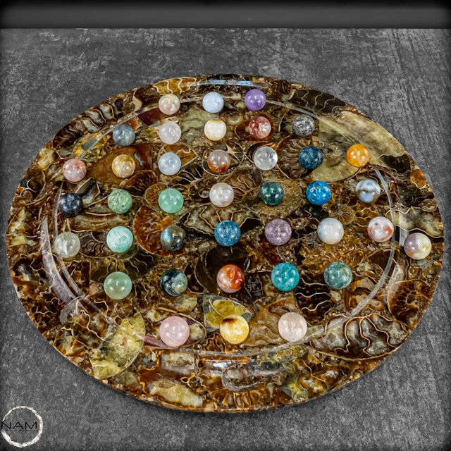 Solitaire game made from an ammonite plate. with gemstone spheres- 2113.42 g