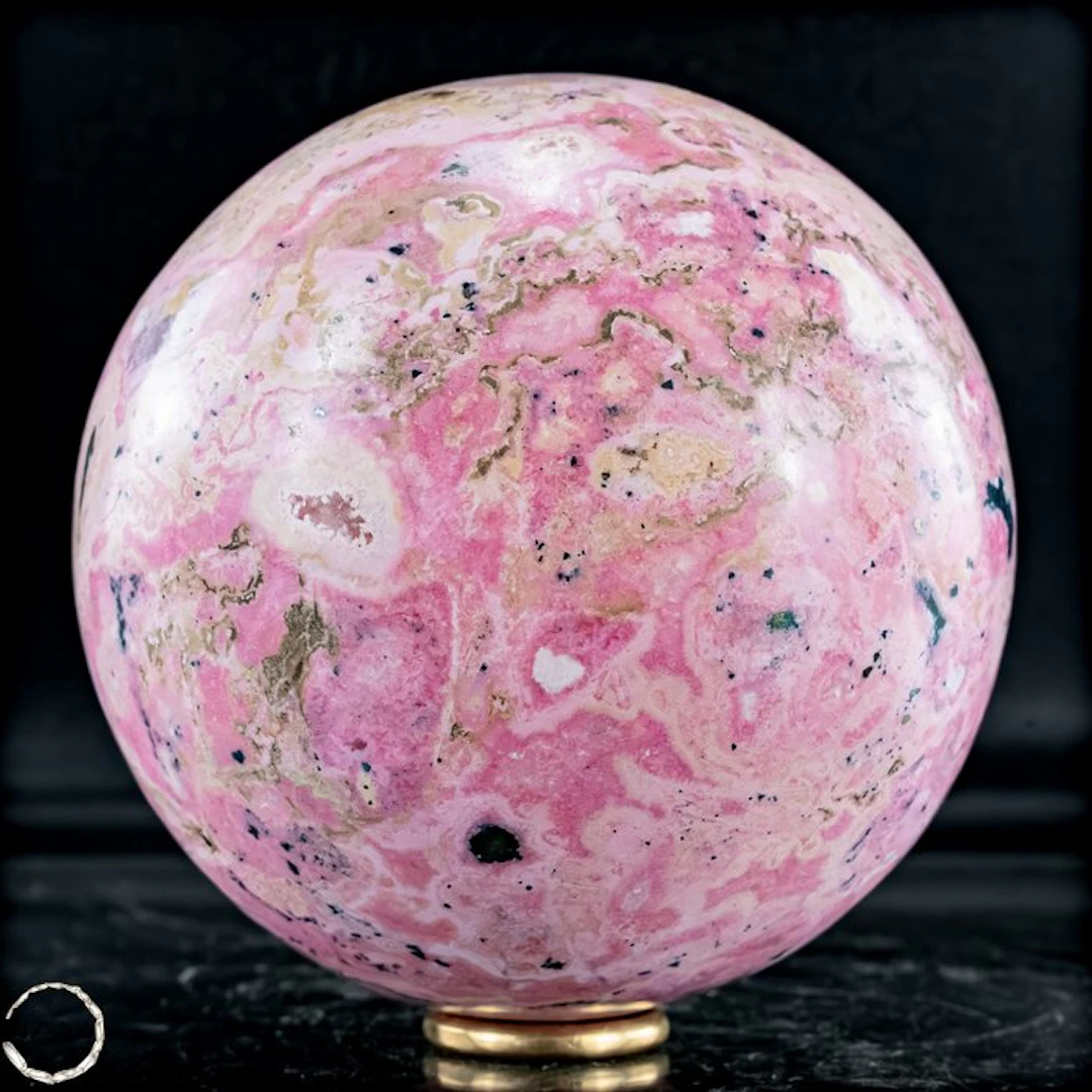 Natural rhodochrosite sphere – delicate rosé with a...