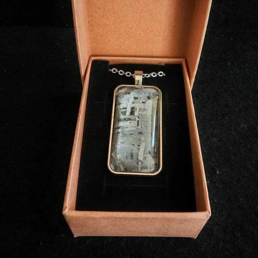 Stainless steel and meteorite pendant with stainless steel chain