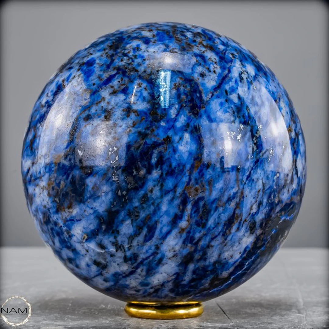 Natural sodalite sphere – Deep blue elegance as an...
