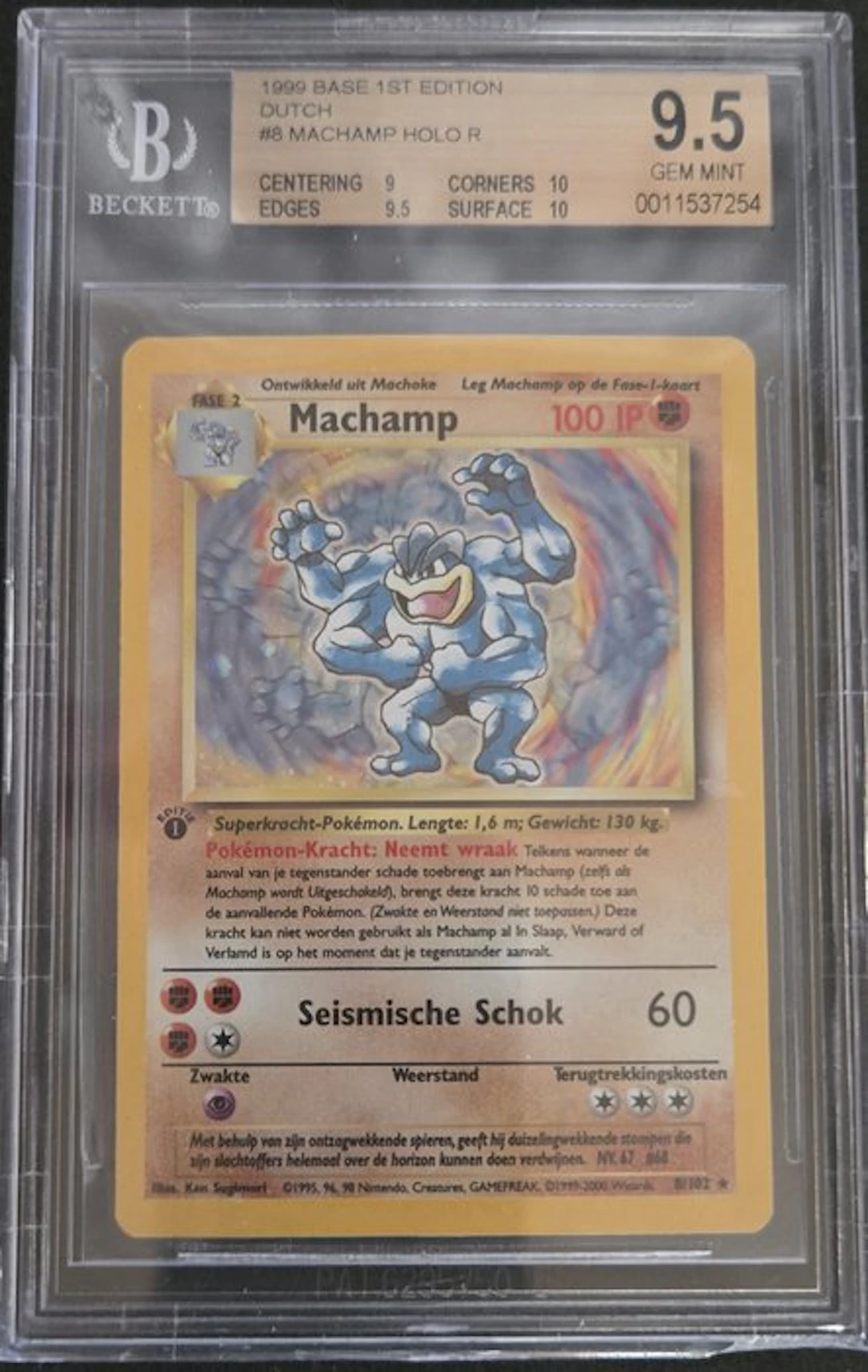 Pokémon - 1 Graded card - Machamp #8 First edition