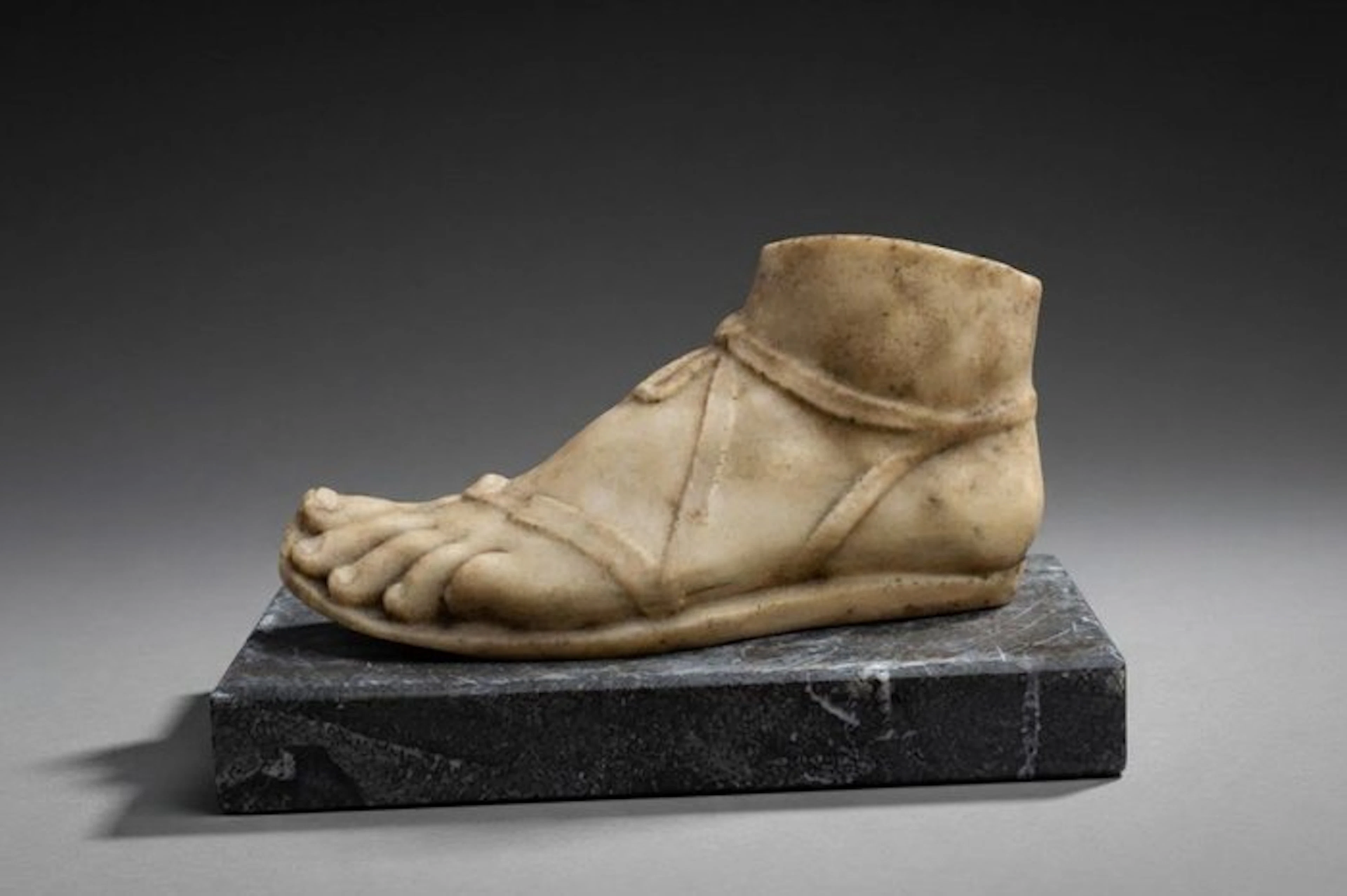 Figure - Reconstructed Carrara marble foot in Greco-Roman style.