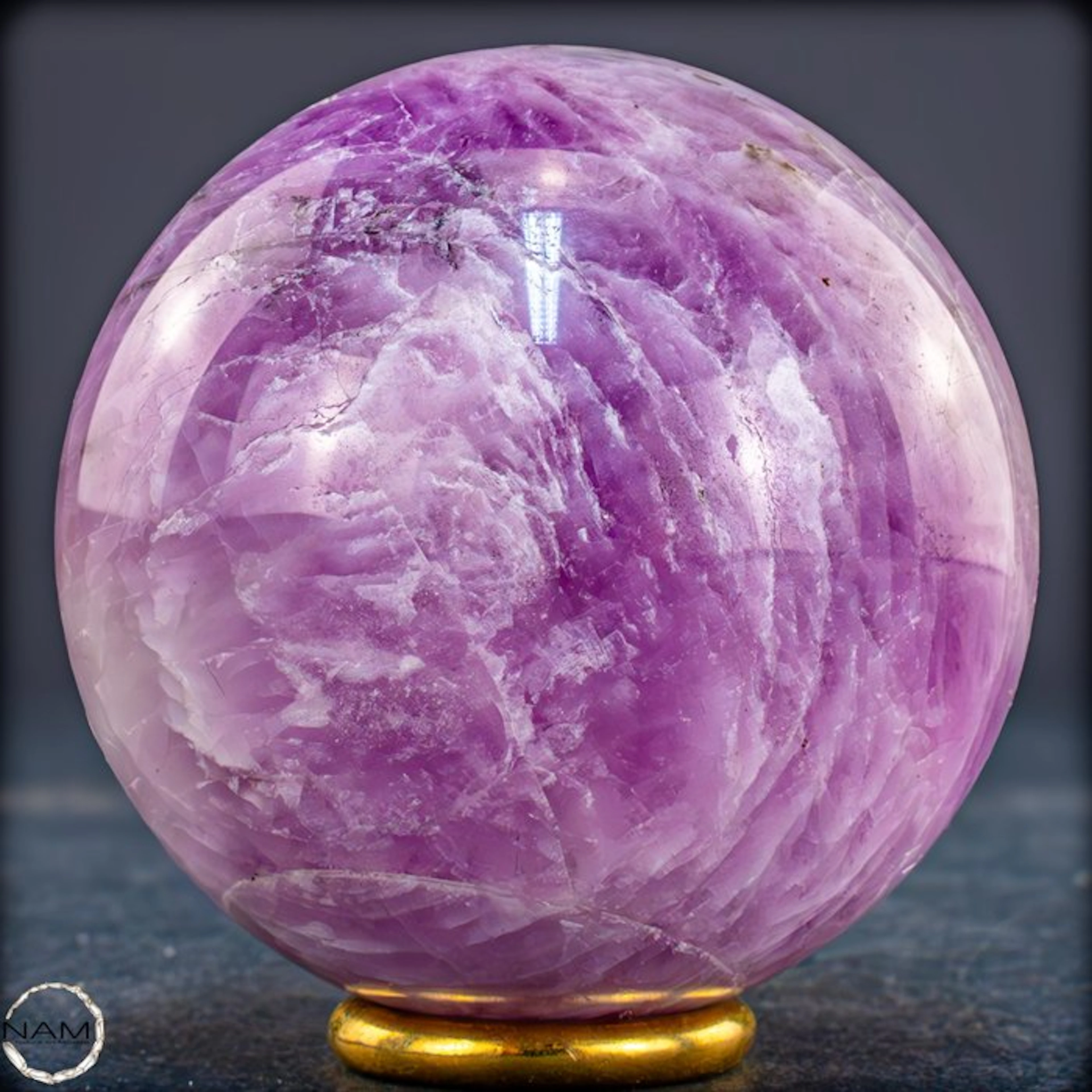Majestic kunzite ball with a fascinating cat's-eye effect...
