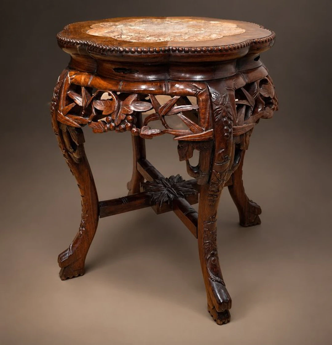 Antique wooden side table with refined carving