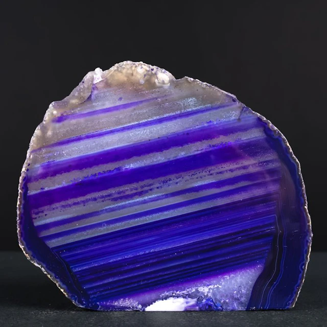Purple-banded agate slice – striking color play in deep...