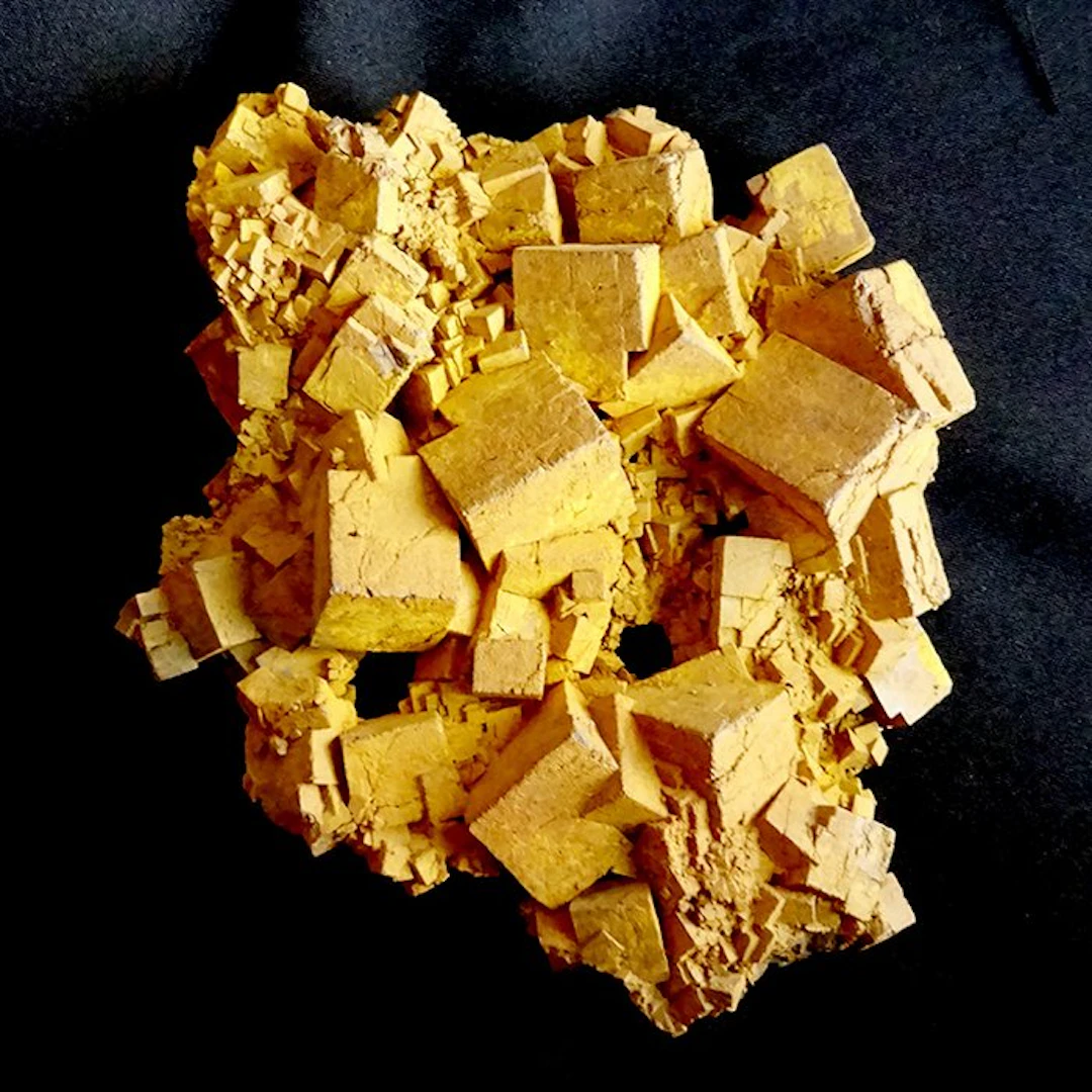 Aggregation of macle cubes of limonite pseudomorphic...