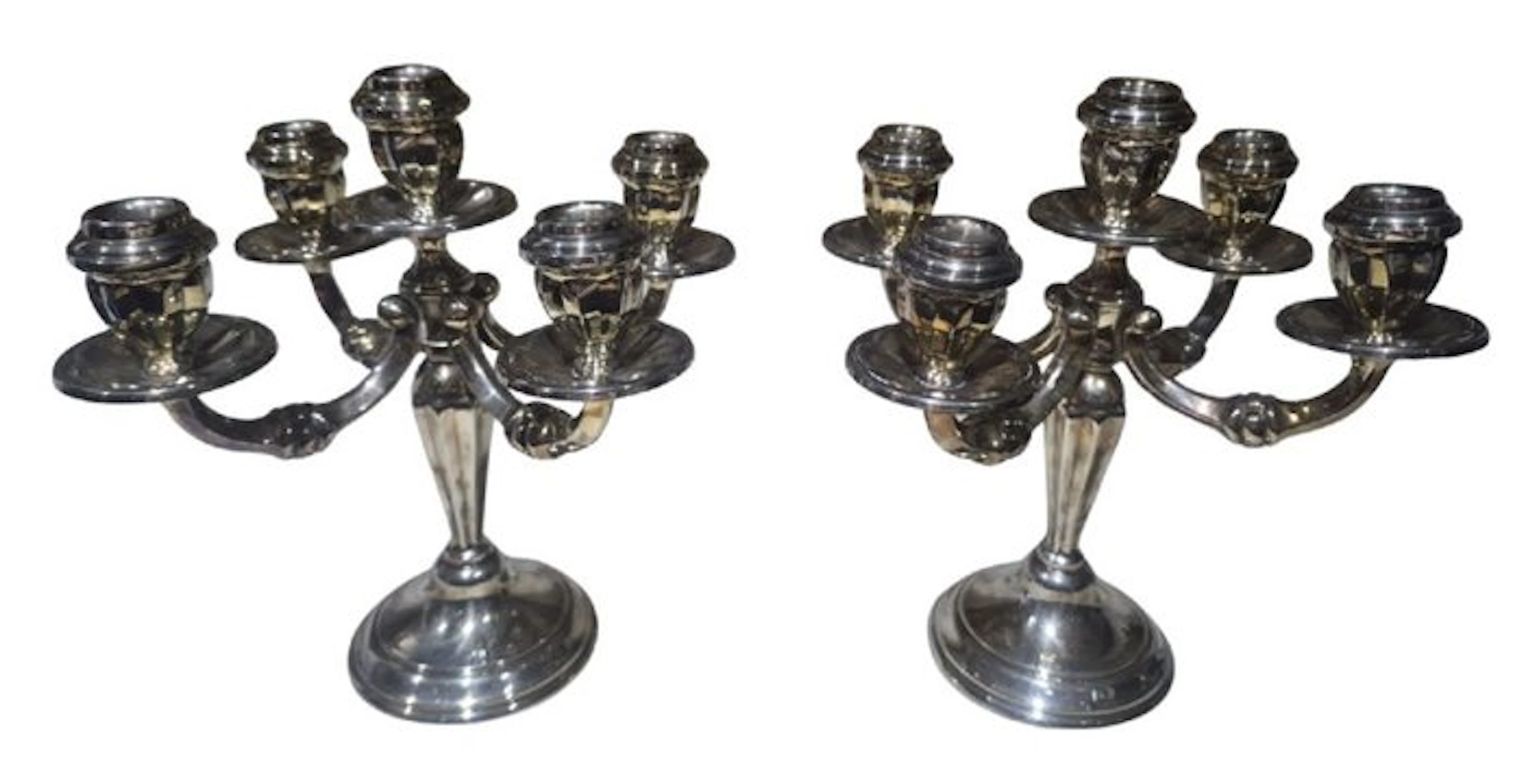 Pareja de candelabros de cinco luces en alpaca