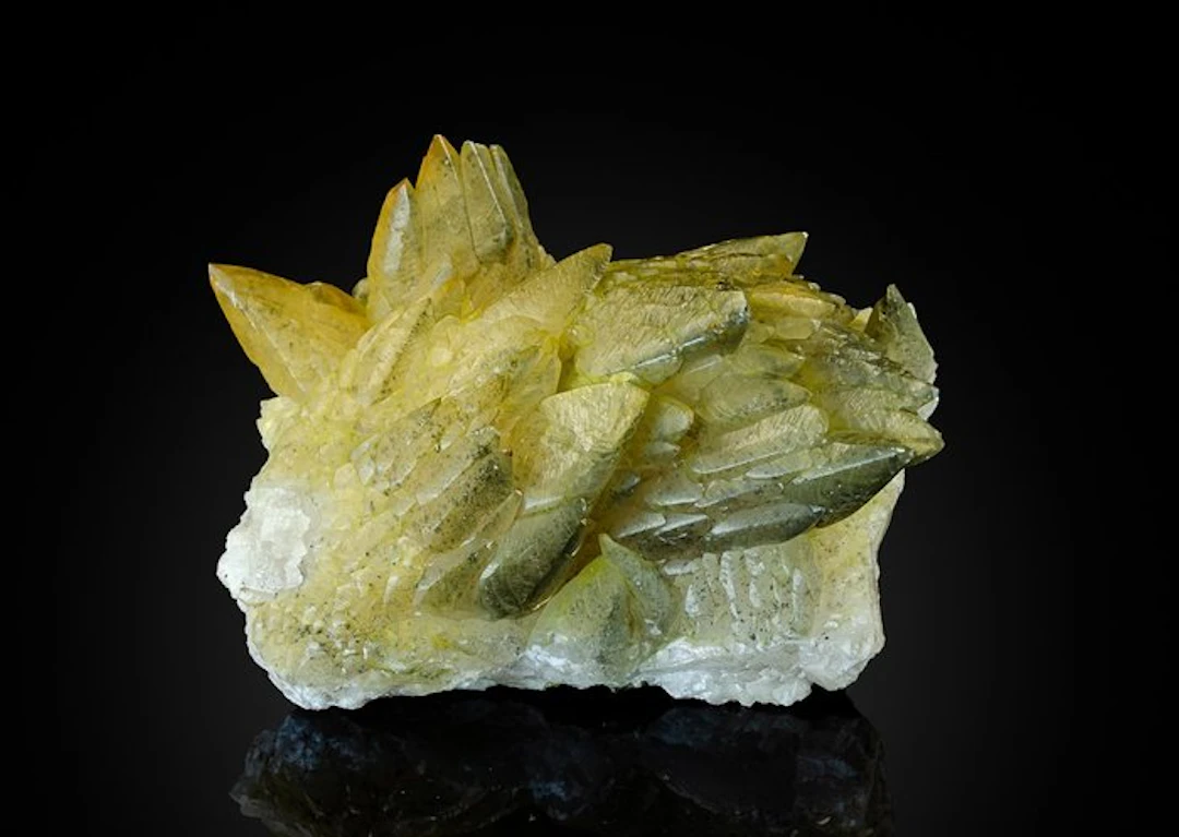 Greenish yellow scalenohedral Calcite colored by...