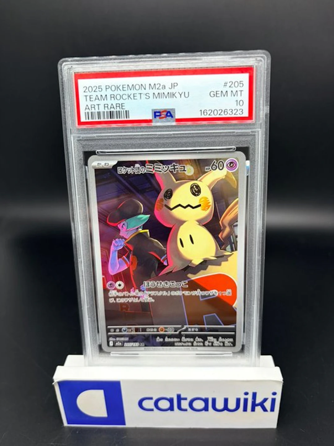 Pokémon - 1 Graded card - Team Rocket's Mimikyu - 205/193...